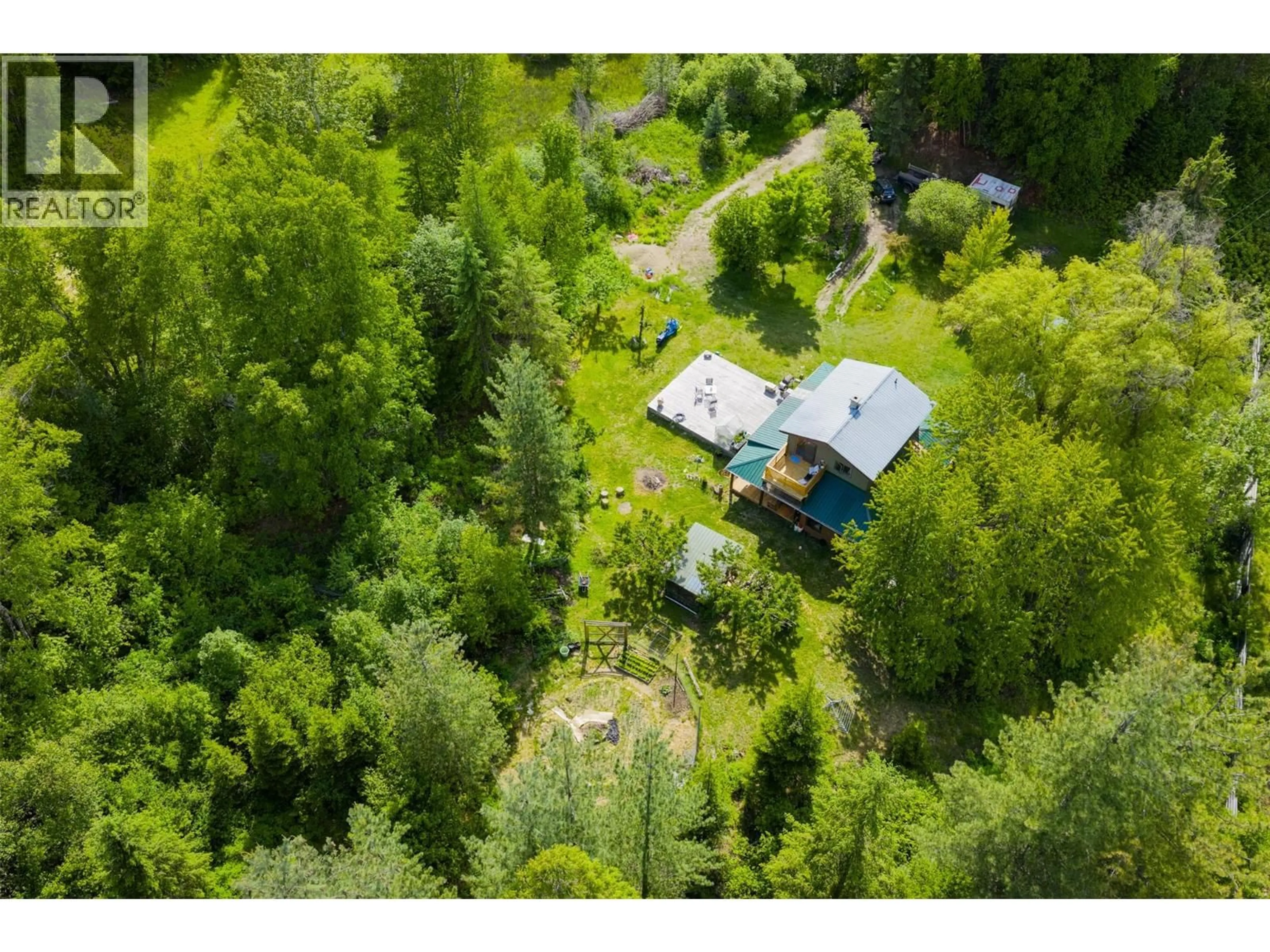 A pic from outside/outdoor area/front of a property/back of a property/a pic from drone, forest/trees view for 7010 PERRYS CEMETERY ROAD, Winlaw British Columbia V0G2J0