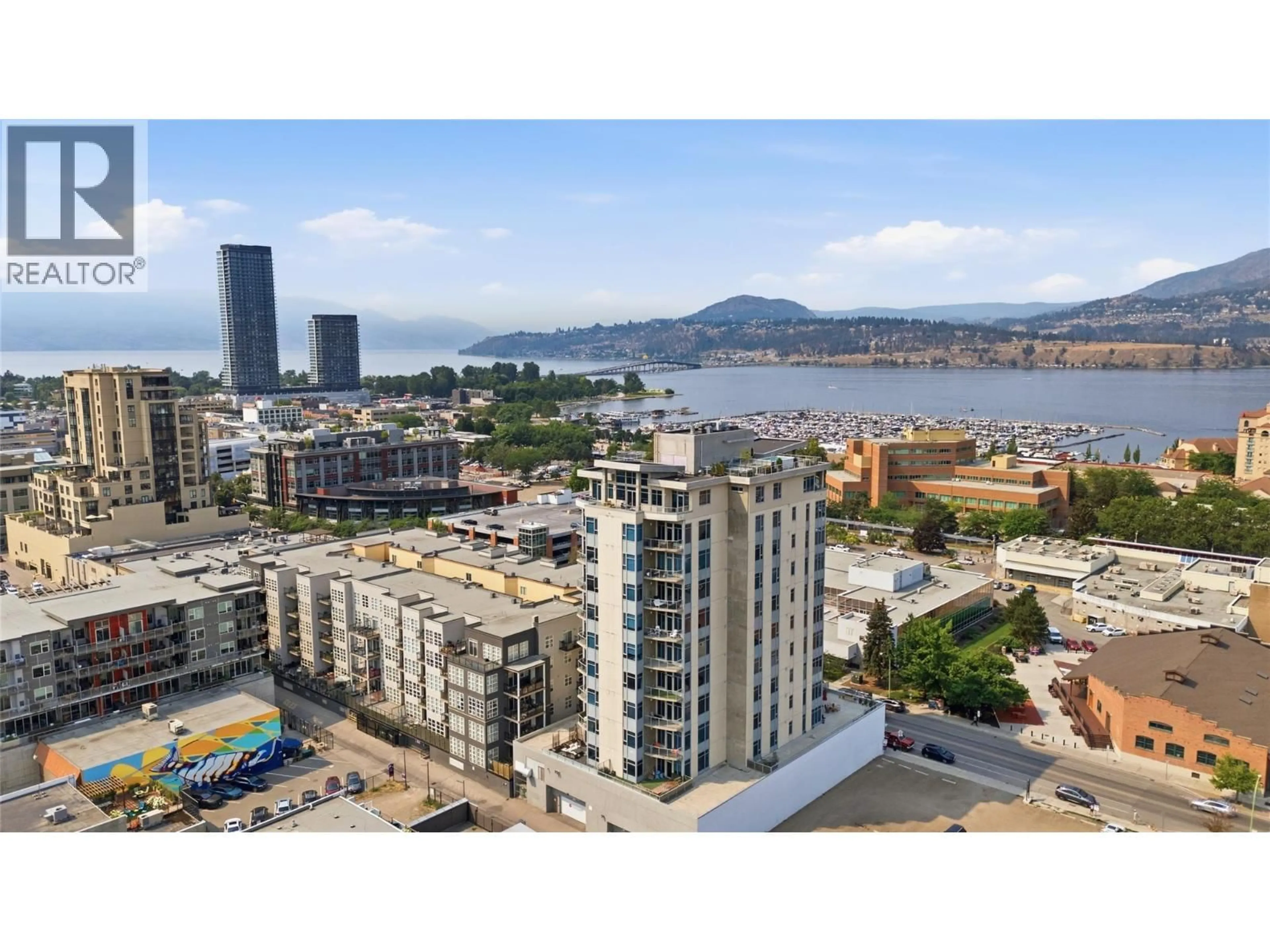 A pic from outside/outdoor area/front of a property/back of a property/a pic from drone, city buildings view from balcony for 704 - 1329 ELLIS STREET, Kelowna British Columbia V1Y9X5