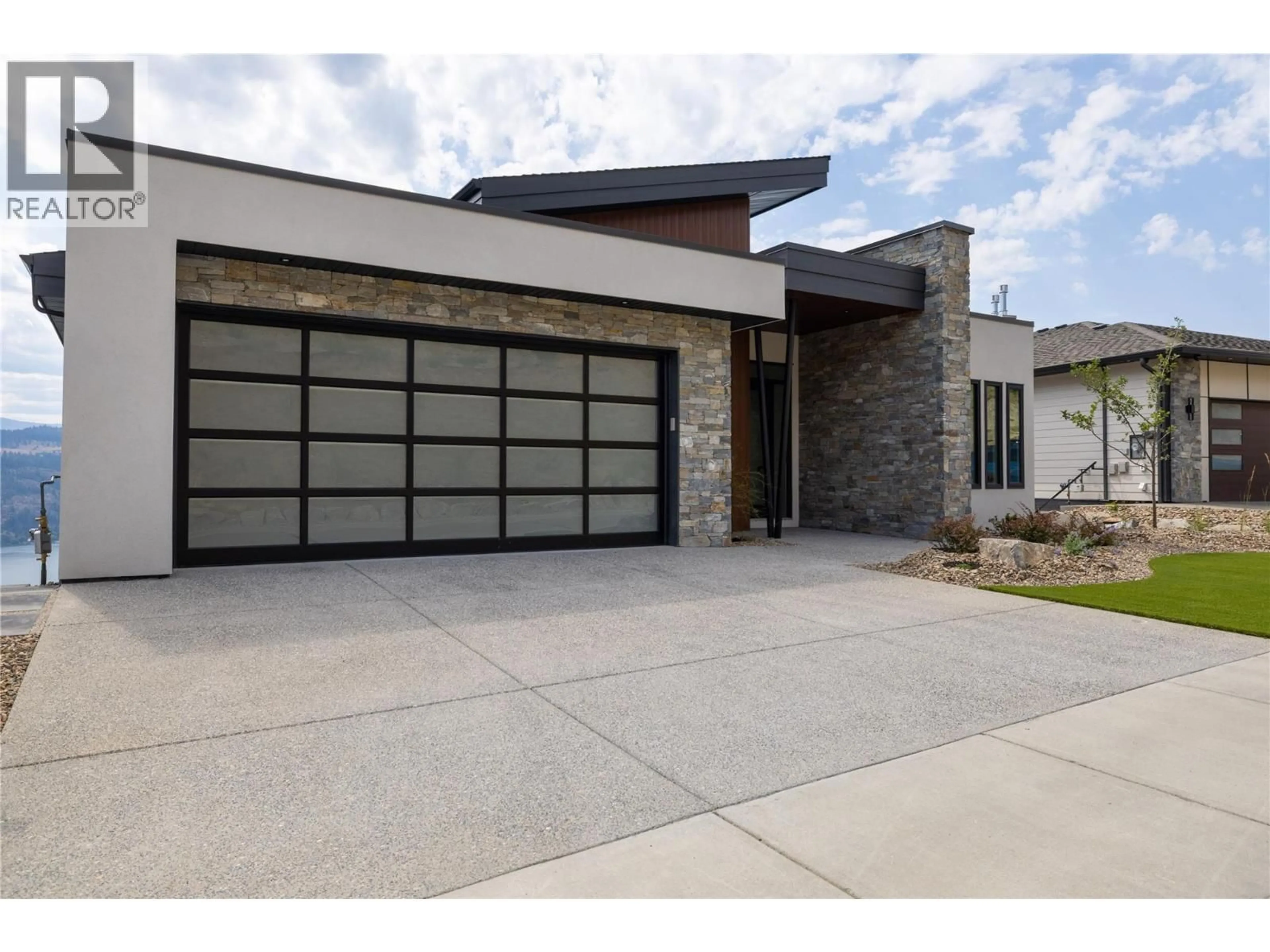 Home with brick exterior material, street for 8828 OXFORD ROAD, Vernon British Columbia V1H2K8