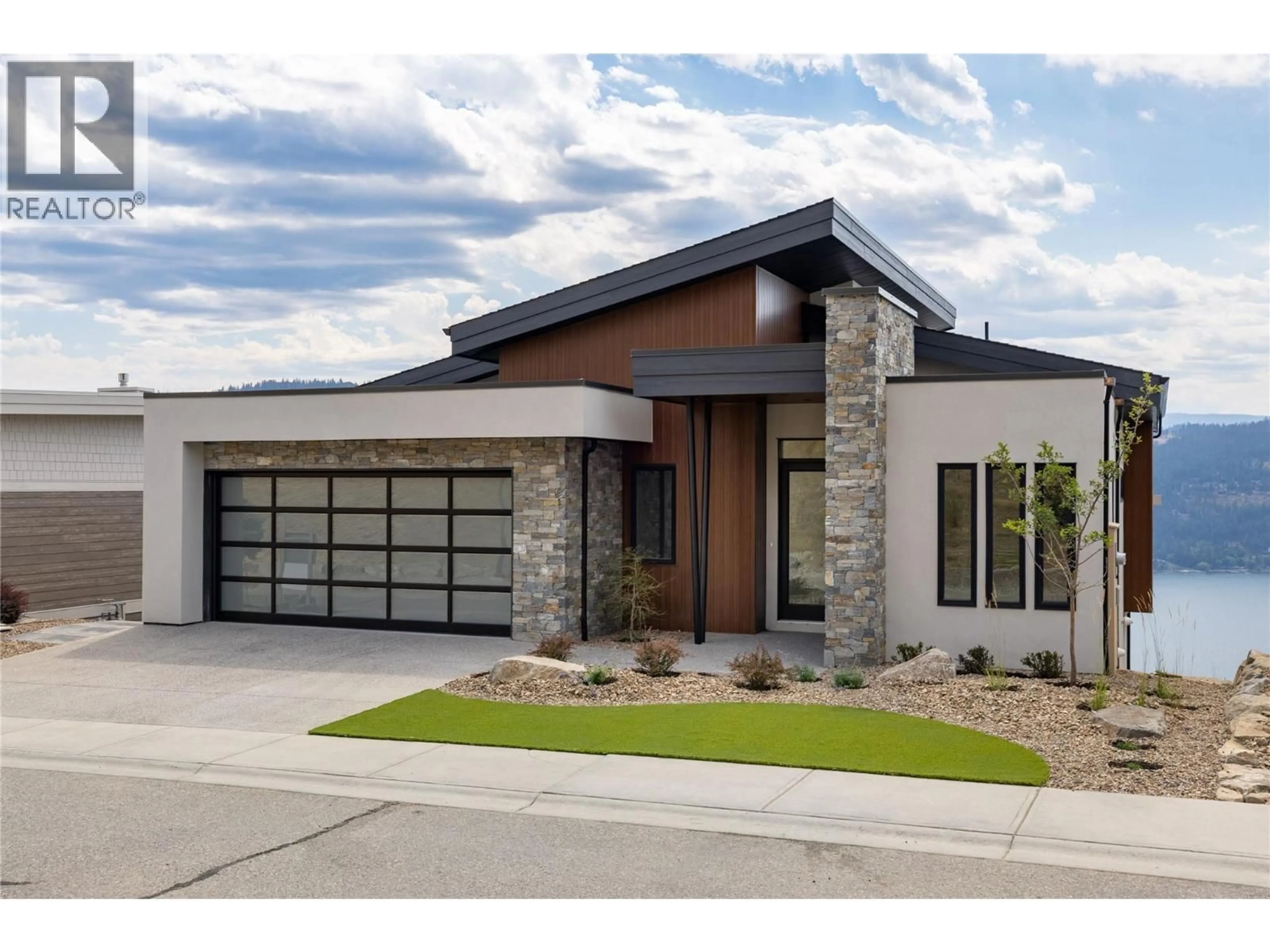 Home with brick exterior material, street for 8828 OXFORD ROAD, Vernon British Columbia V1H2K8