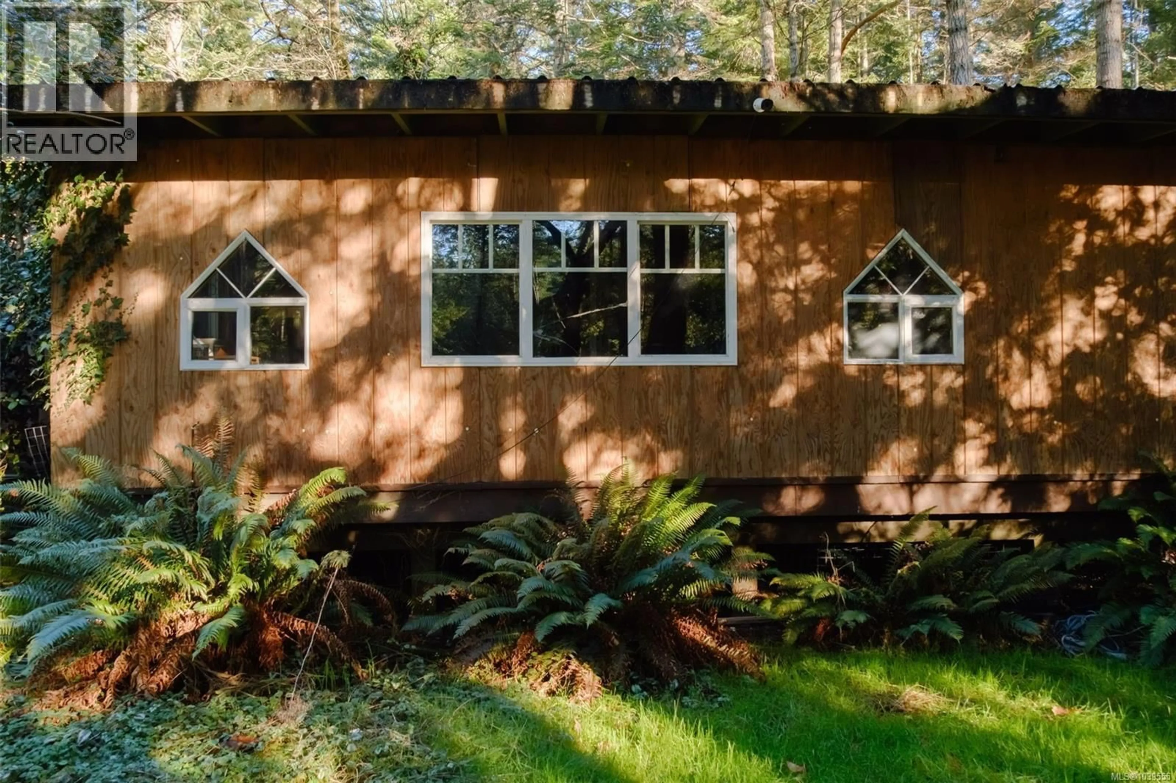 Home with vinyl exterior material, forest/trees view for 1900 MARTIN ROAD, Gabriola Island British Columbia V0R1X7