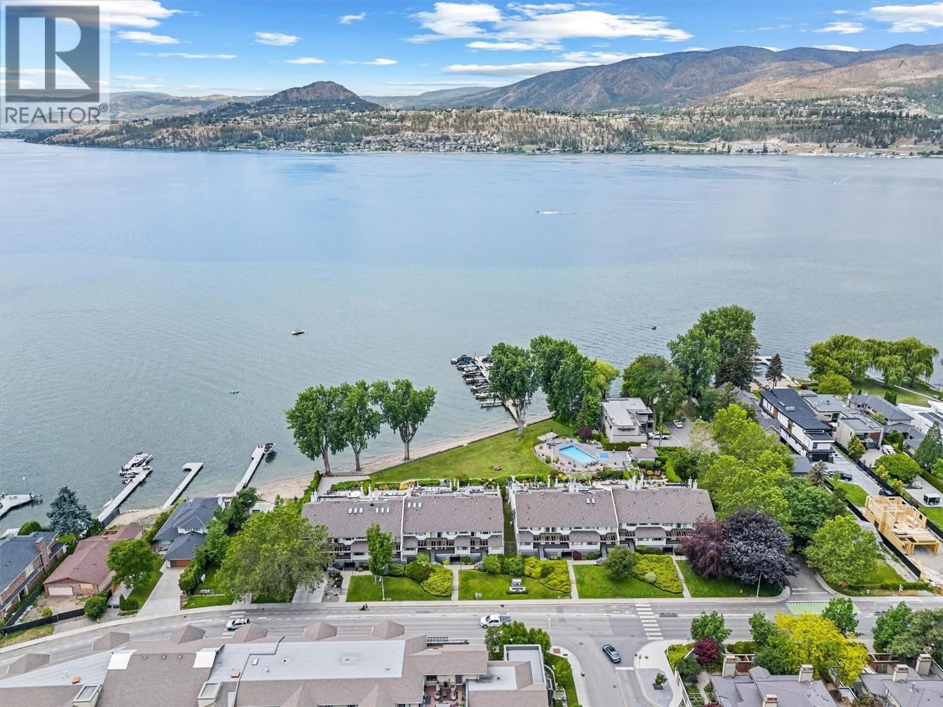 A pic from outside/outdoor area/front of a property/back of a property/a pic from drone, water/lake/river/ocean view for 202 - 2900 ABBOTT STREET, Kelowna British Columbia V1Y1G6