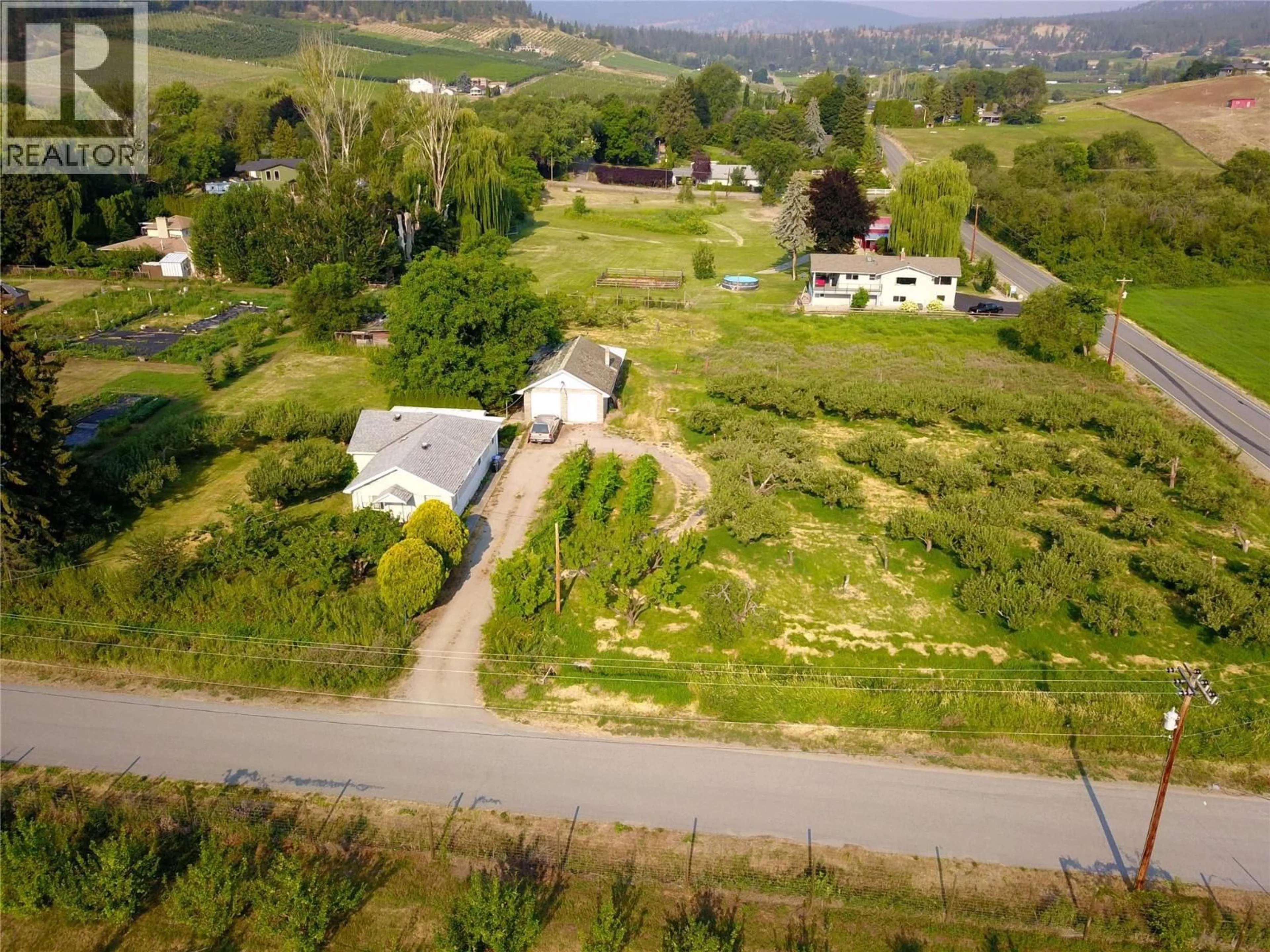 A pic from outside/outdoor area/front of a property/back of a property/a pic from drone, mountain view for 10216 LUMSDEN AVENUE, Summerland British Columbia V0H1Z8