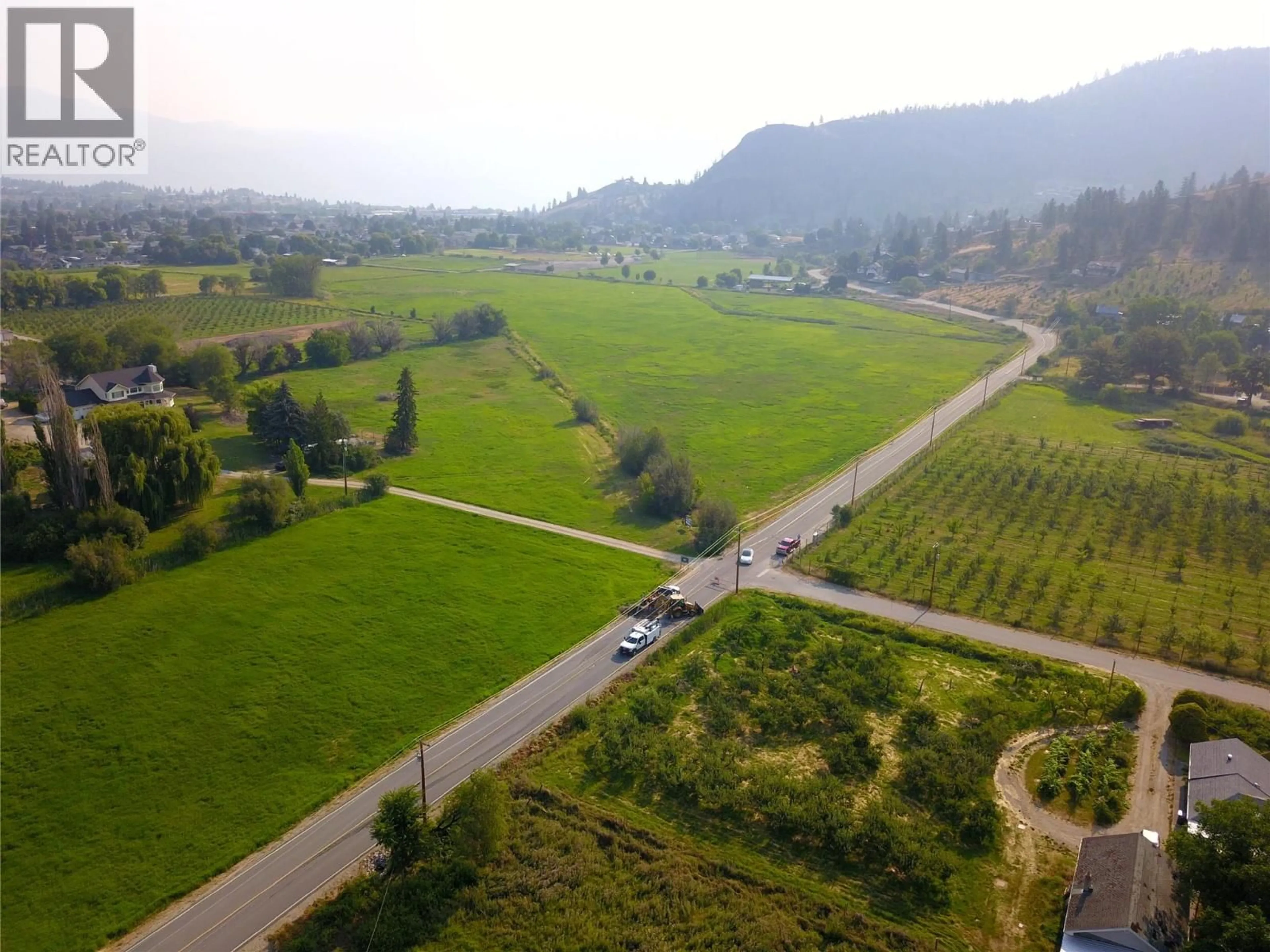 A pic from outside/outdoor area/front of a property/back of a property/a pic from drone, mountain view for 10216 LUMSDEN AVENUE, Summerland British Columbia V0H1Z8