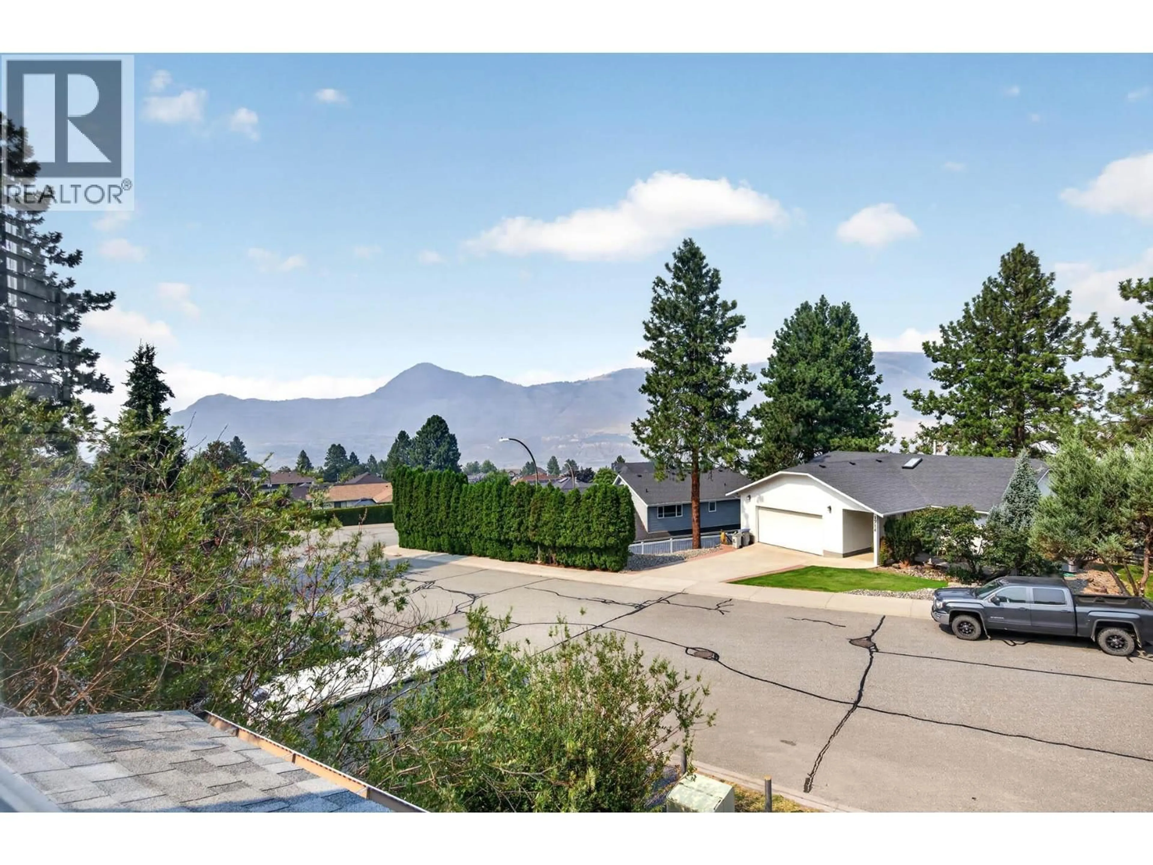 A pic from outside/outdoor area/front of a property/back of a property/a pic from drone, mountain view for 1725 COLDWATER DRIVE, Kamloops British Columbia V2E2R3