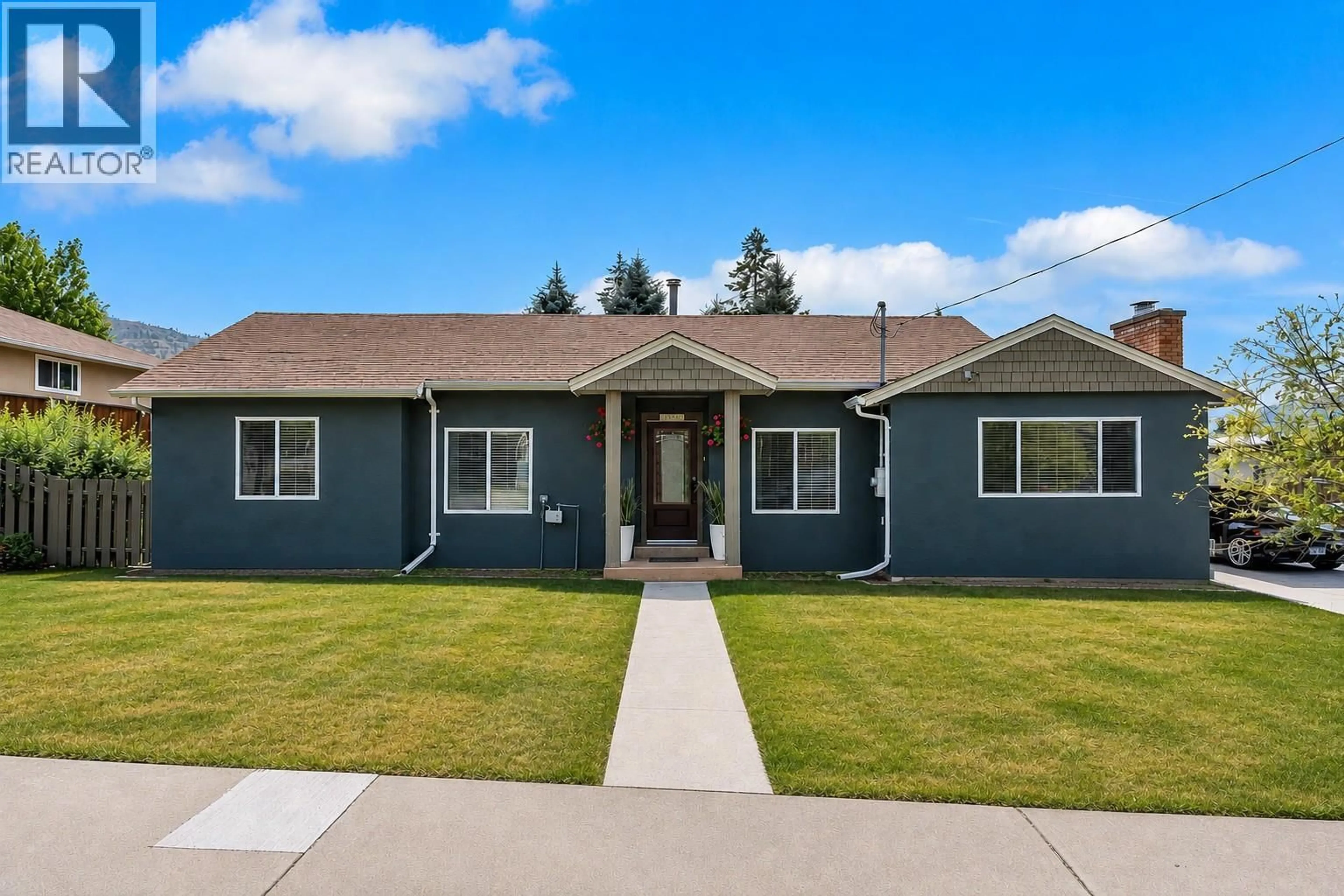 Home with vinyl exterior material, street for 1366 RIDGEDALE AVENUE, Penticton British Columbia V2A2S2