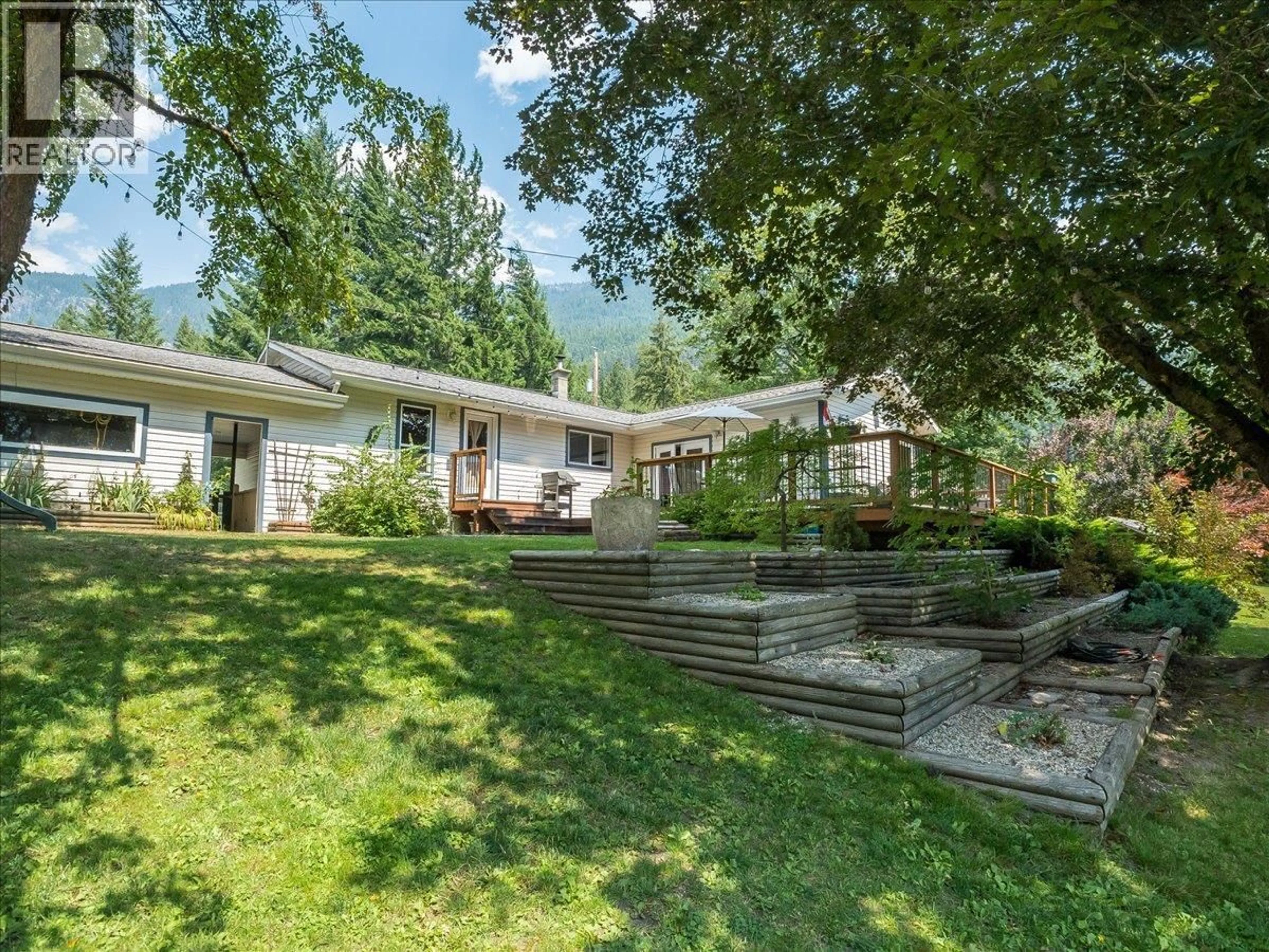 A pic from outside/outdoor area/front of a property/back of a property/a pic from drone, mountain view for 2451 CUNNINGHAM ROAD, Slocan Park British Columbia V0G2E0