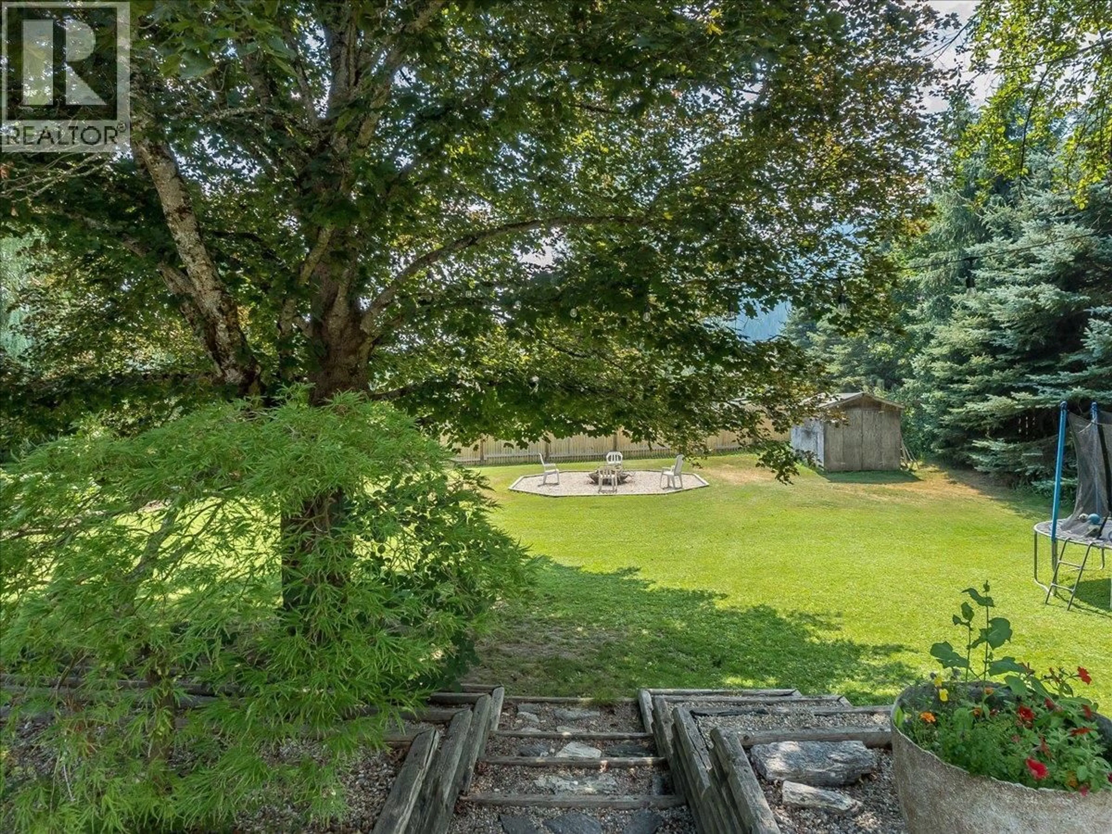 A pic from outside/outdoor area/front of a property/back of a property/a pic from drone, forest/trees view for 2451 CUNNINGHAM ROAD, Slocan Park British Columbia V0G2E0