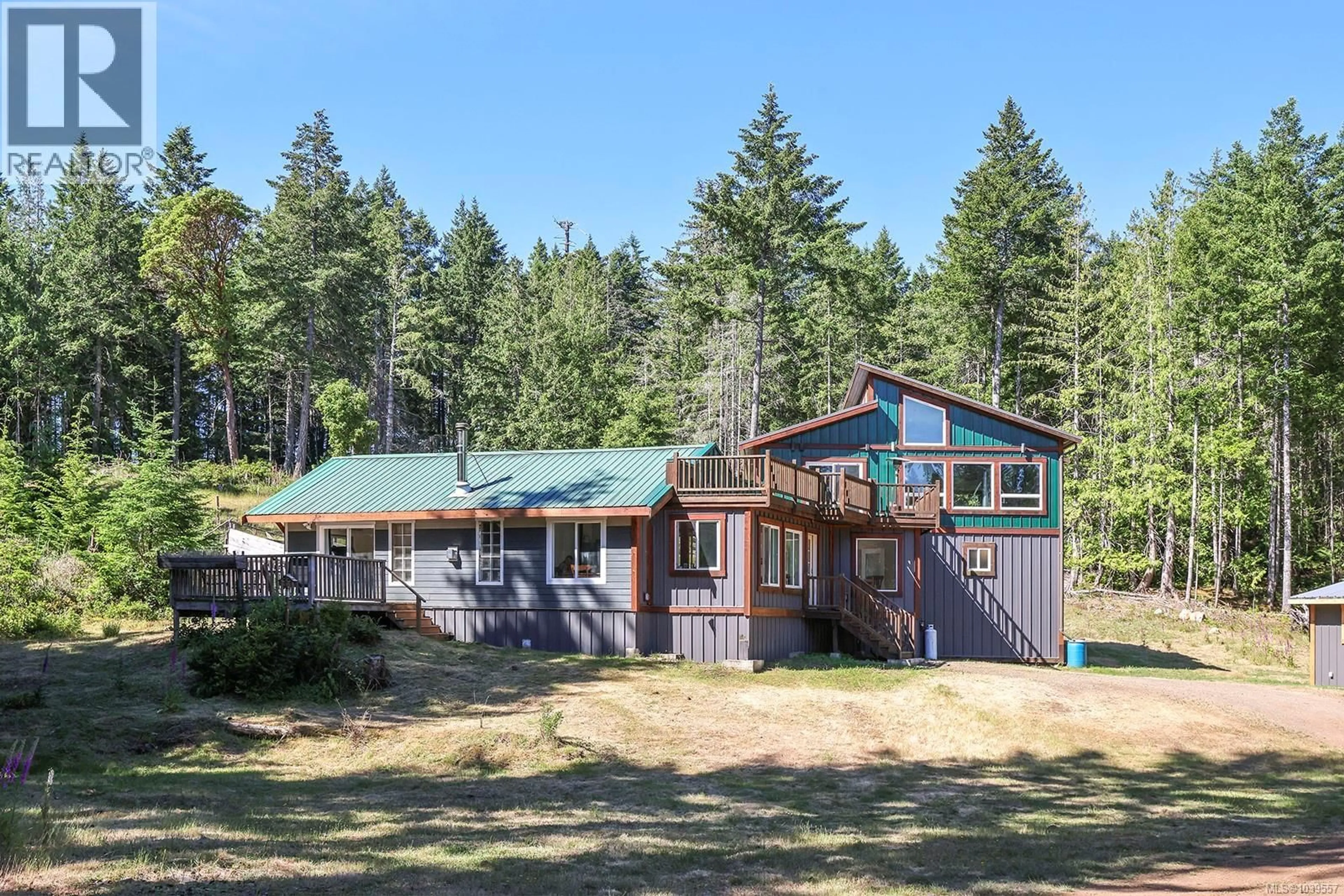 A pic from outside/outdoor area/front of a property/back of a property/a pic from drone, unknown for 8400 OWL CRESCENT, Denman Island British Columbia V0R1T0