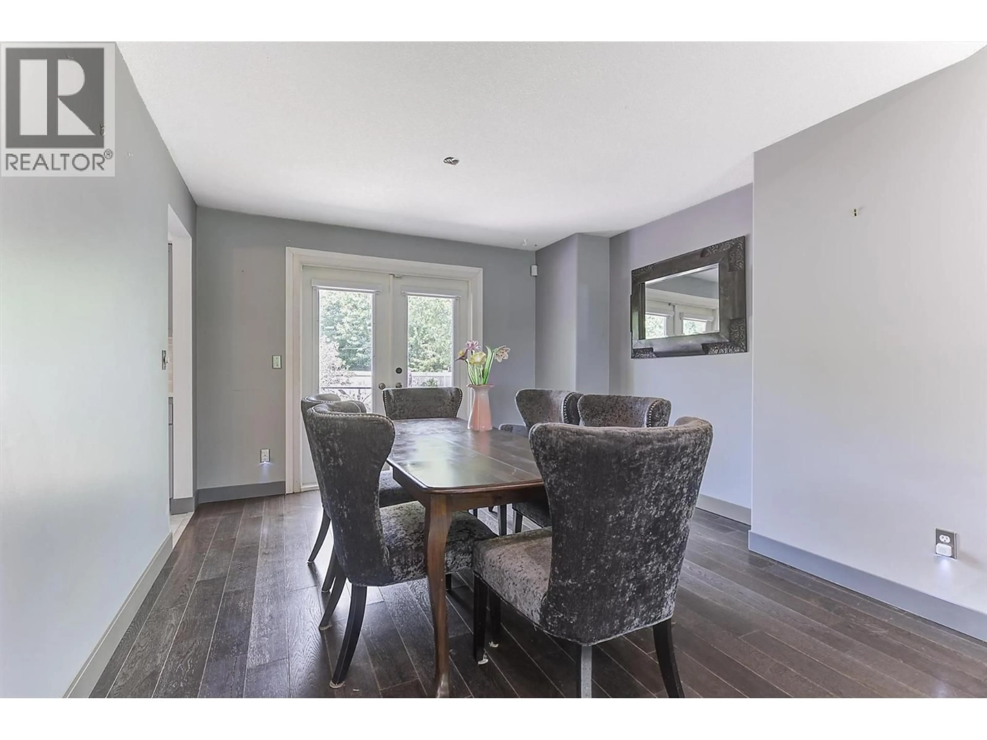 Dining room, wood/laminate floor for 1852 CROSSGLEN COURT, Kelowna British Columbia V1V1S4
