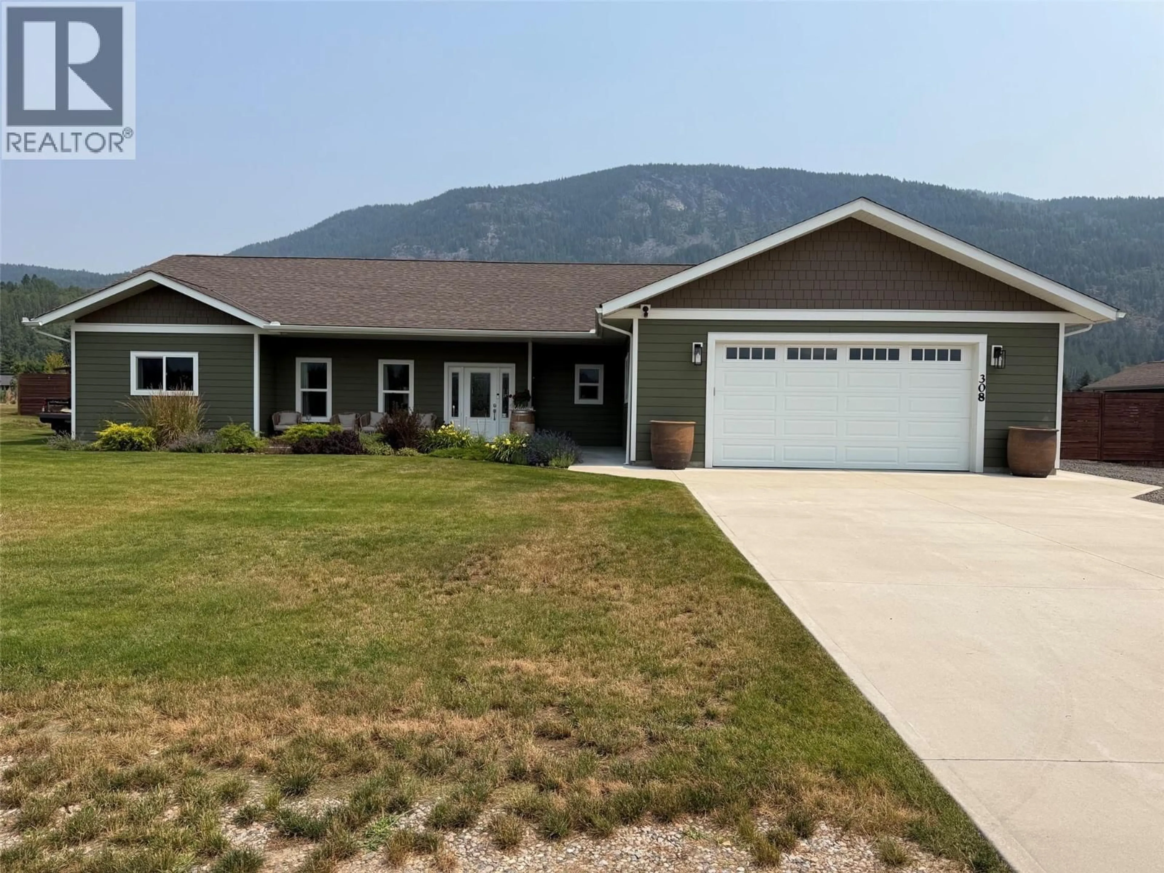 Home with vinyl exterior material, mountain view for 308 ELKVIEW TRAIL, Castlegar British Columbia V1N4L5