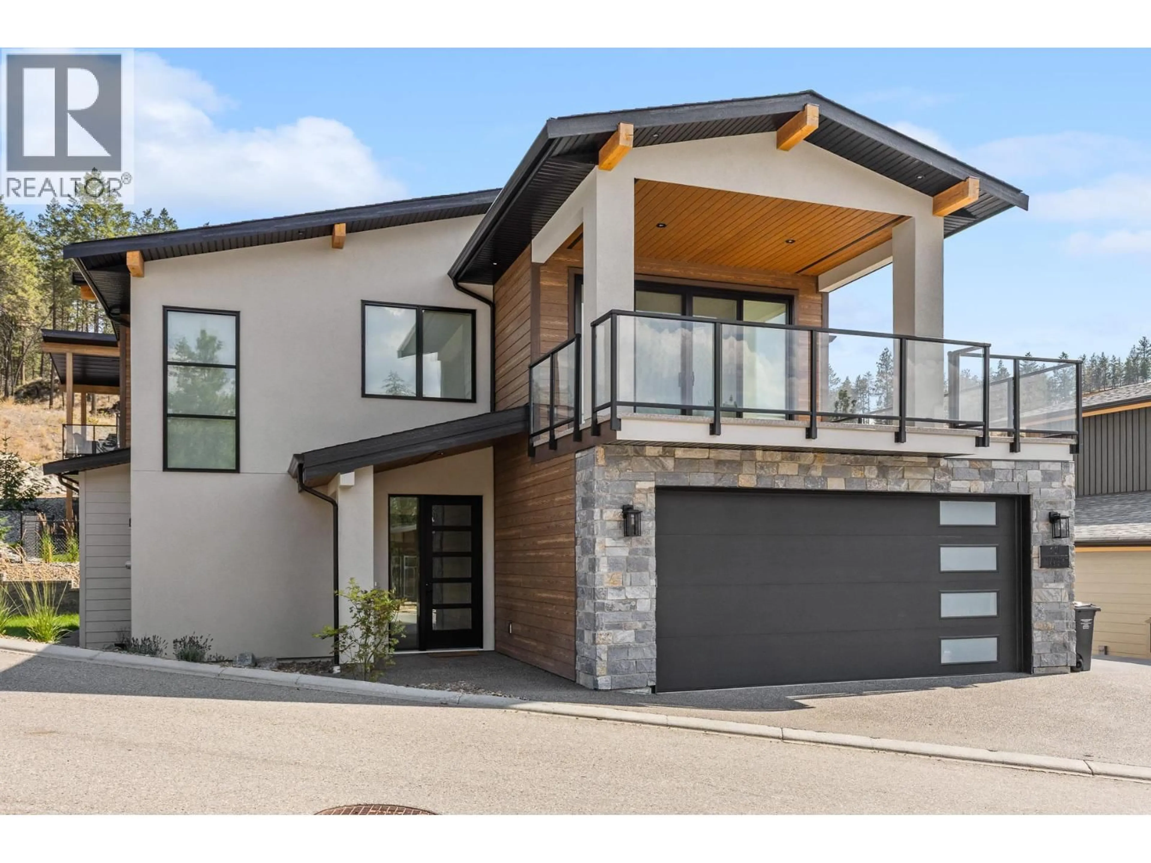 Home with brick exterior material, street for 10 - 1960 NORTHERN FLICKER COURT, Kelowna British Columbia V1V0G3