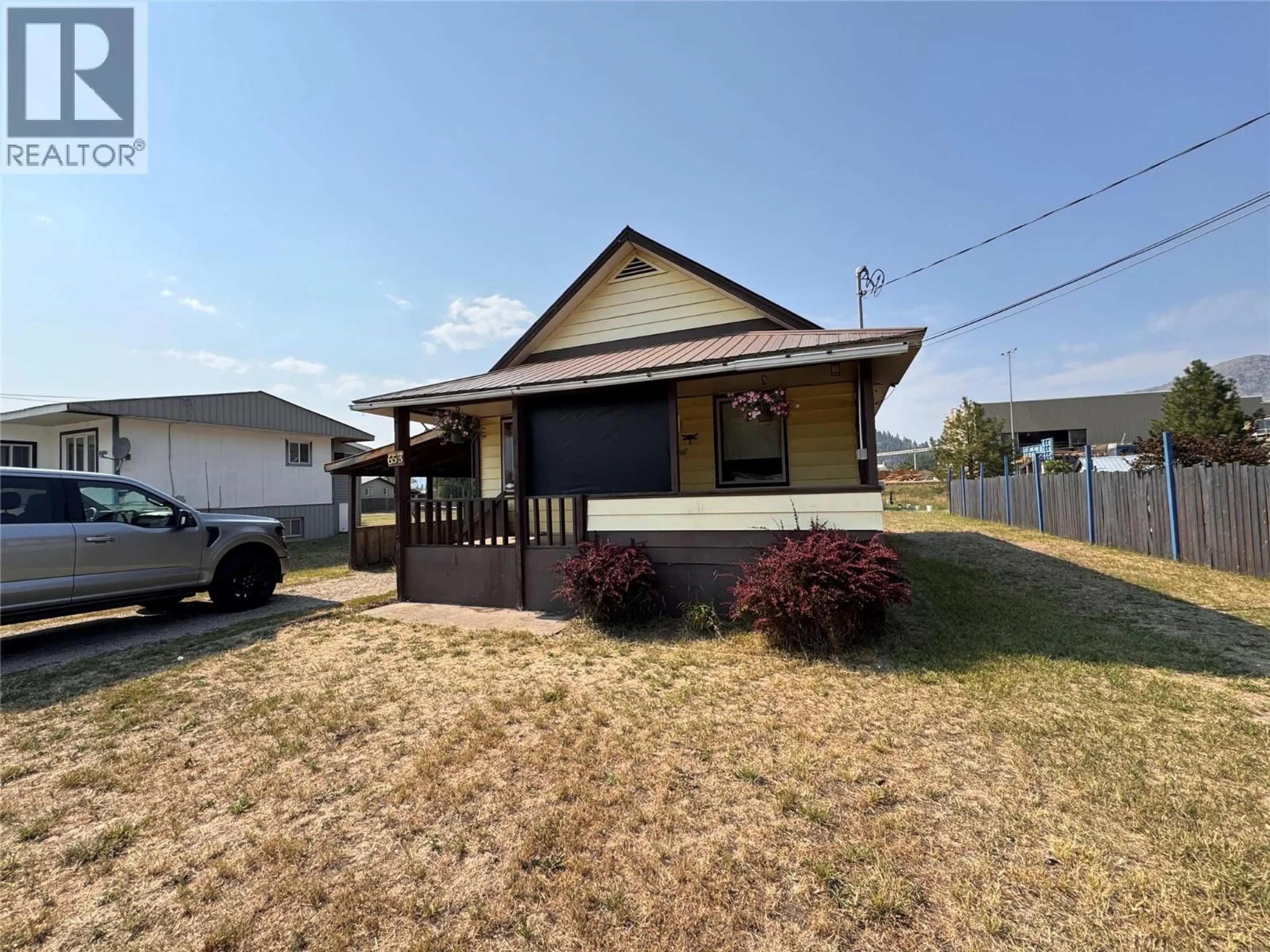 A pic from outside/outdoor area/front of a property/back of a property/a pic from drone, street for 653 65TH AVENUE, Grand Forks British Columbia V0H1H4