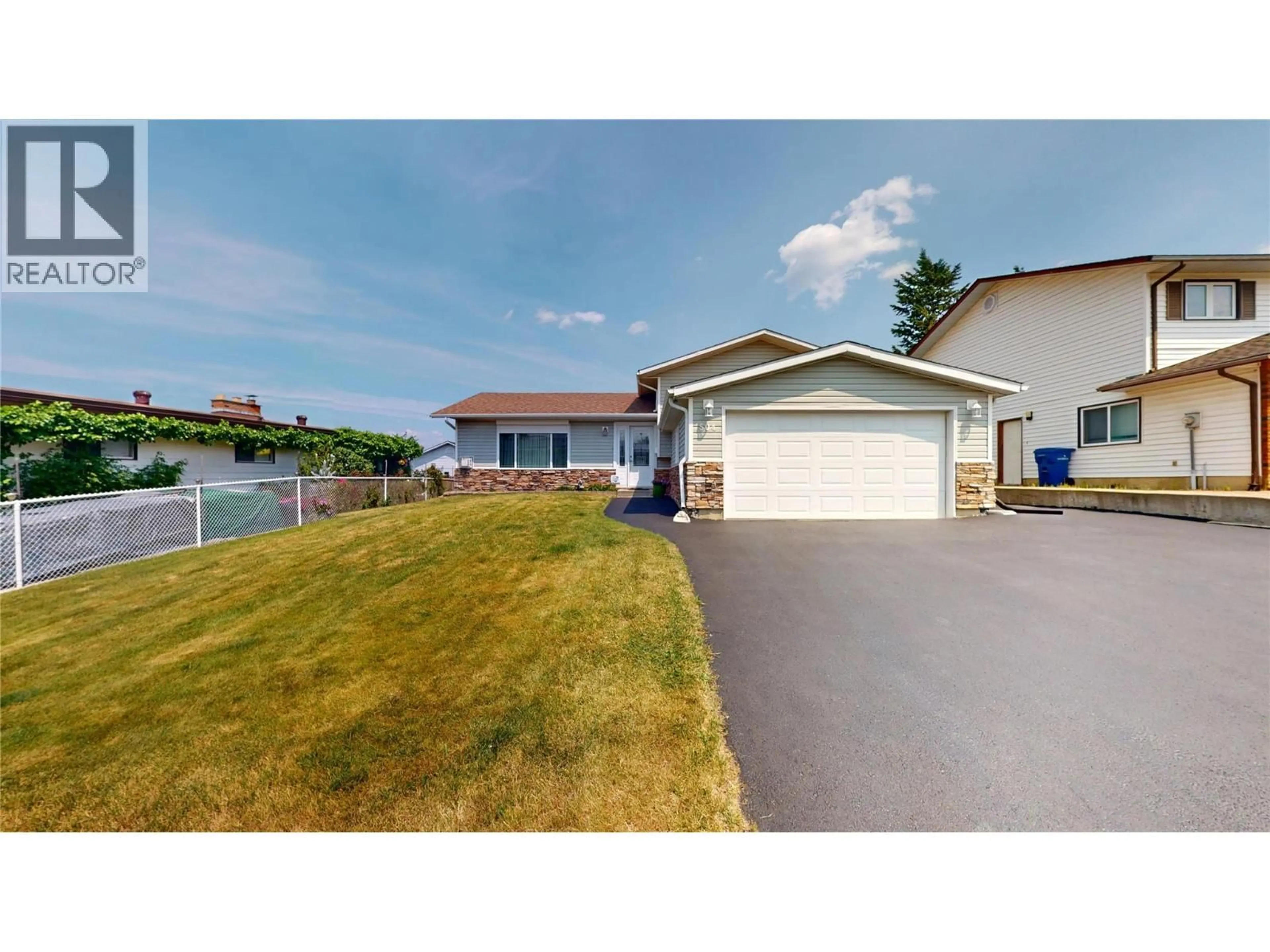 A pic from outside/outdoor area/front of a property/back of a property/a pic from drone, street for 504 16TH STREET SOUTH, Cranbrook British Columbia V1C6H5