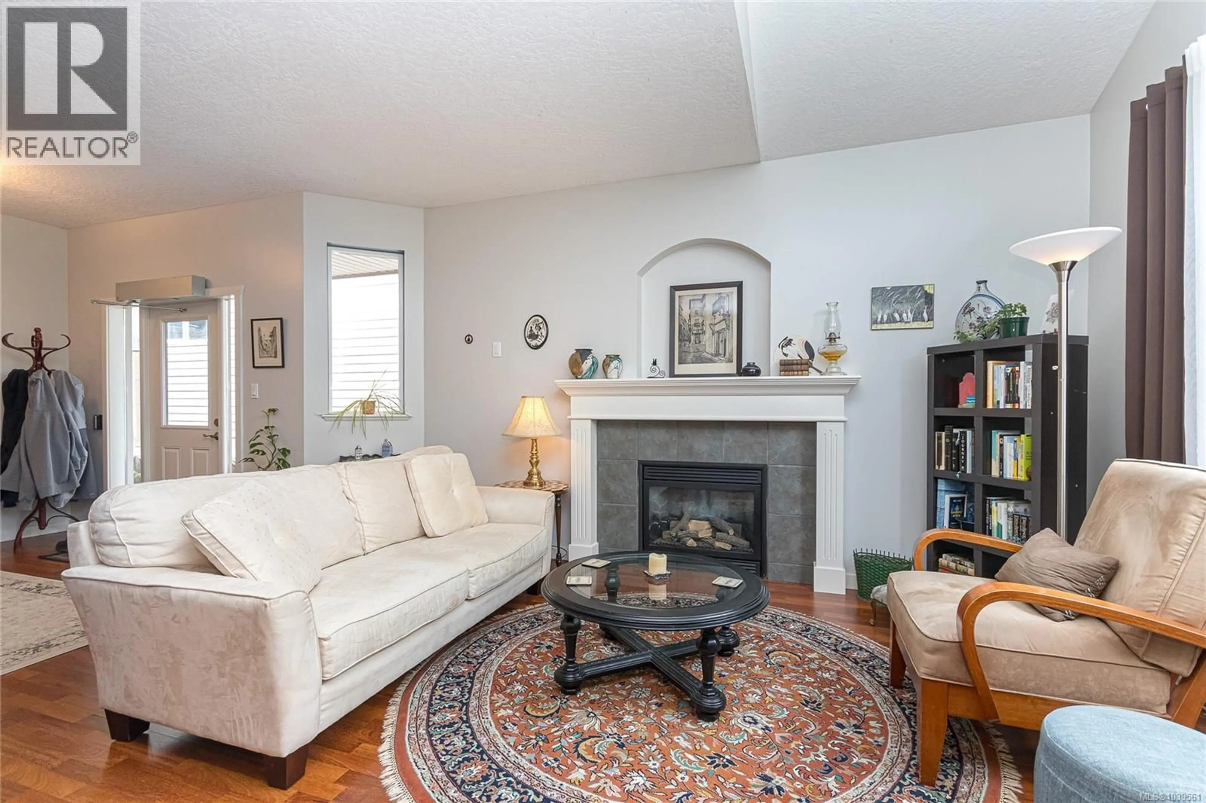 Living room with furniture, unknown for 1001 WILD RIDGE WAY, Langford British Columbia V9C4M8