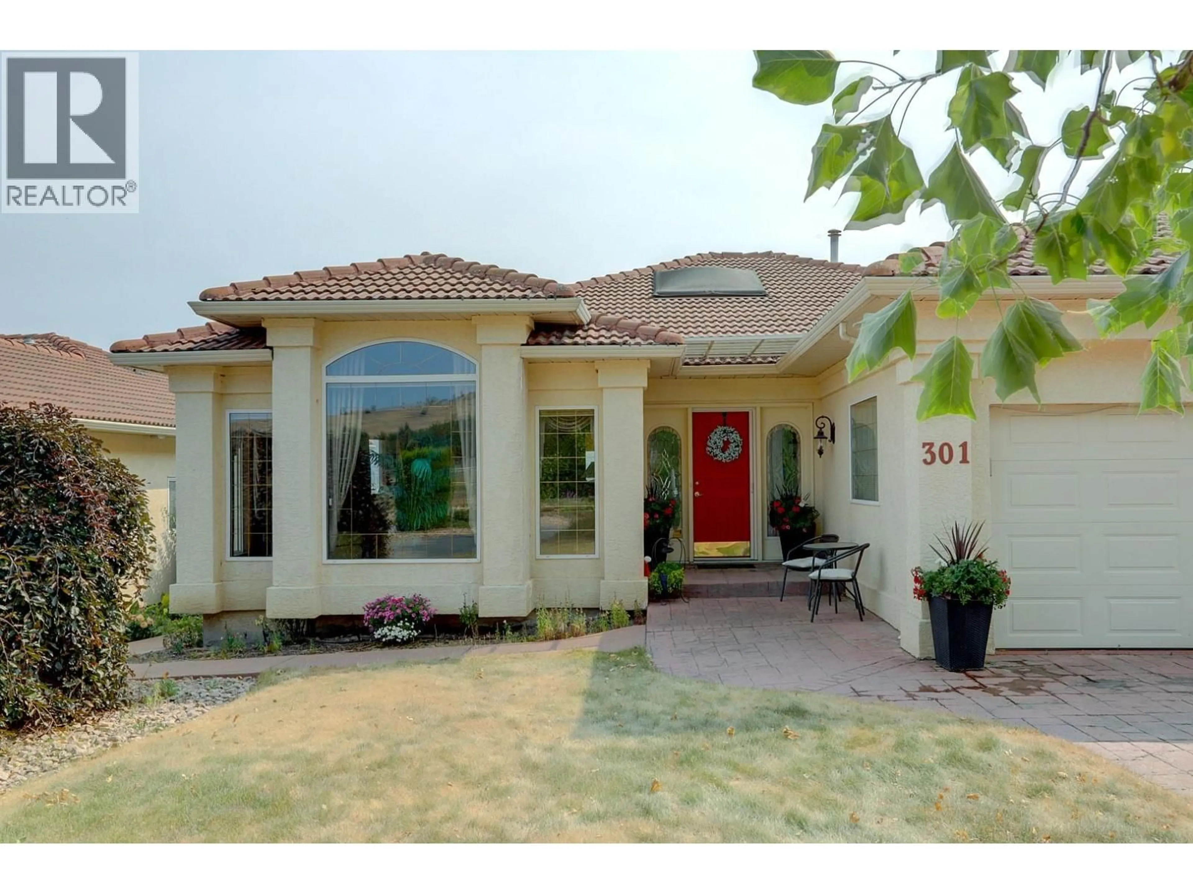 Home with brick exterior material, street for 301 COUNTRY ESTATE PLACE, Vernon British Columbia V1B2W7
