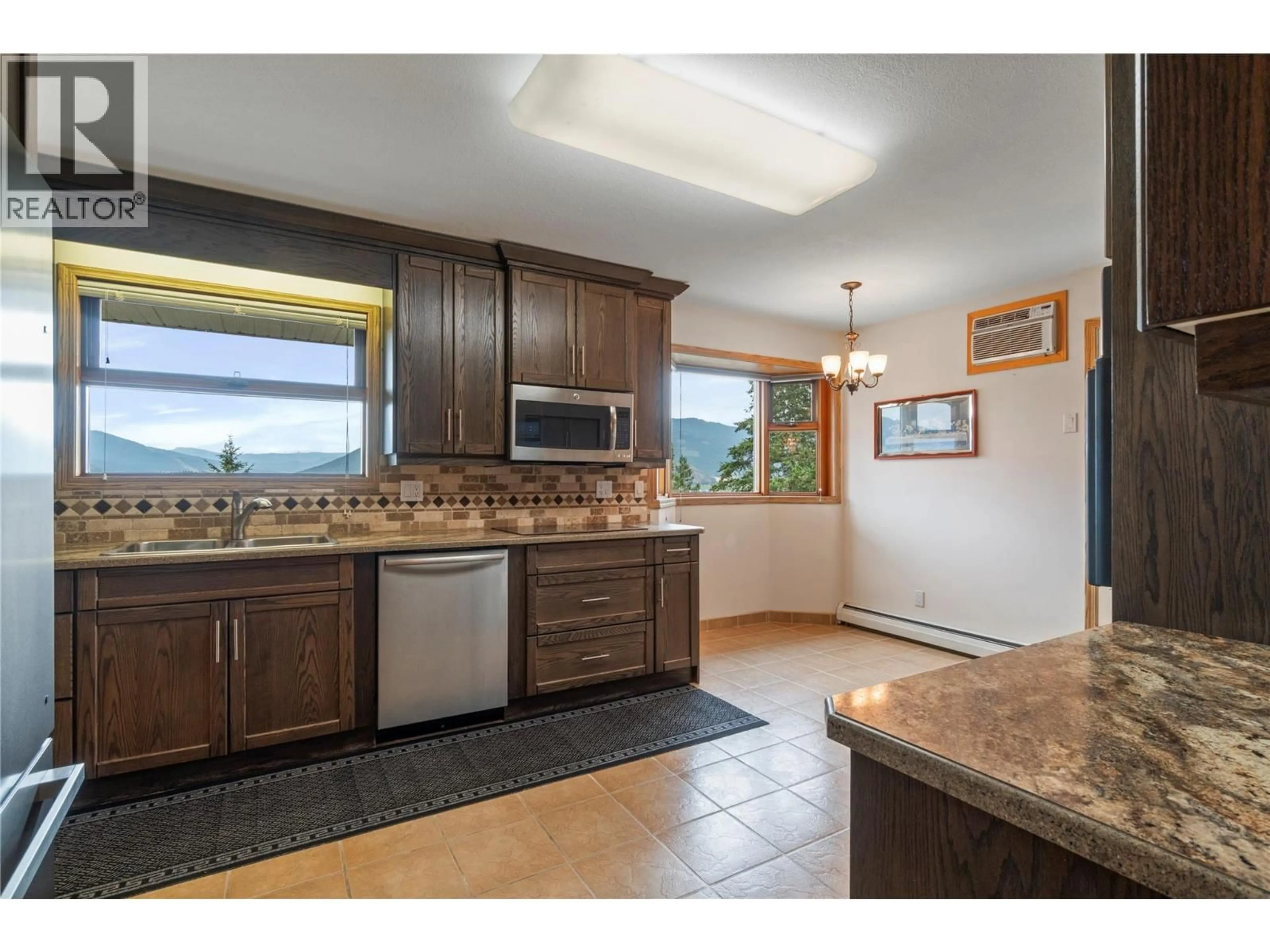 Open concept kitchen, unknown for 1200 LAWES STREET, Enderby British Columbia V4Y4B7