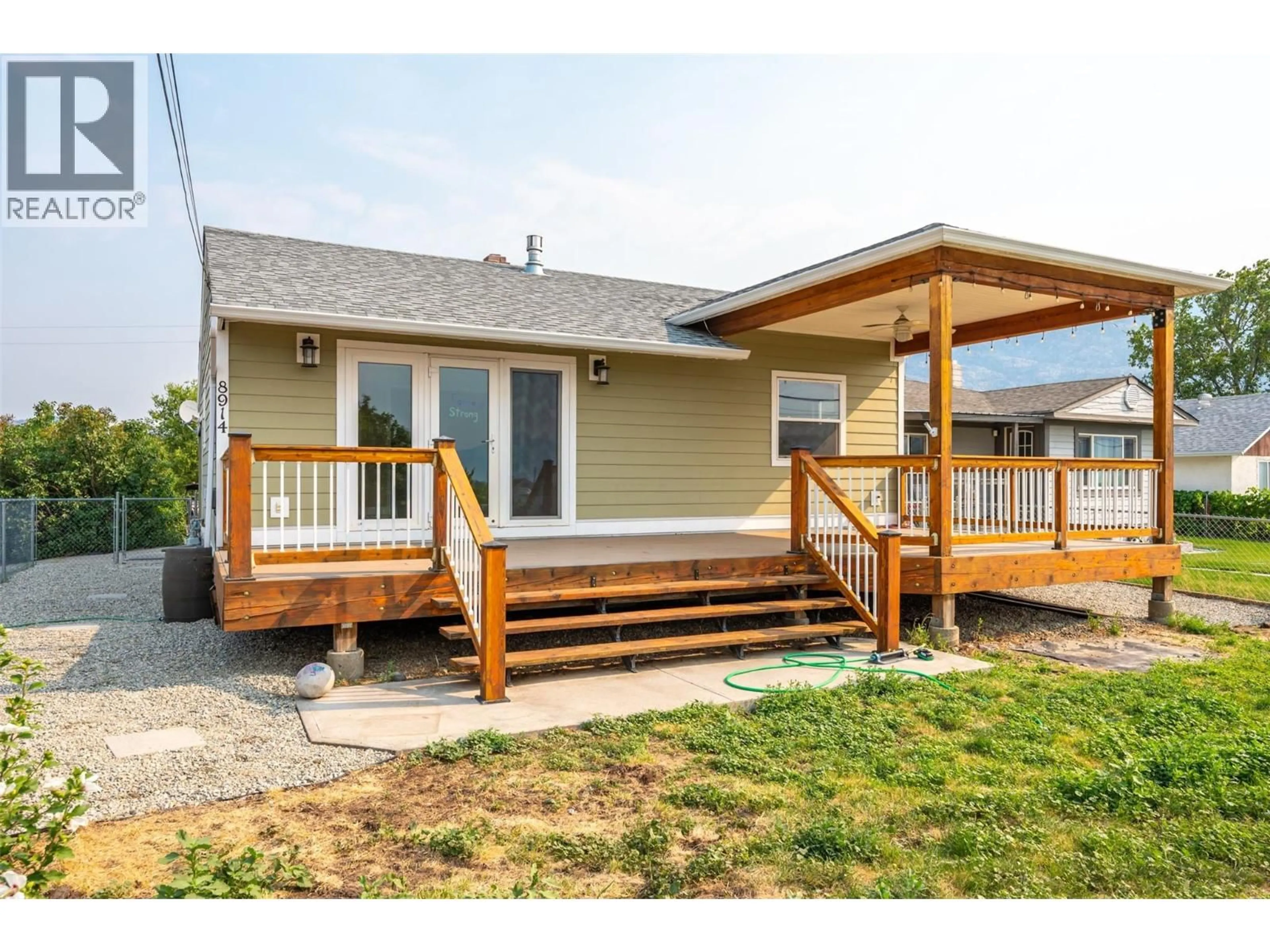 Home with vinyl exterior material, street for 8914 74TH AVENUE, Osoyoos British Columbia V0H1V0