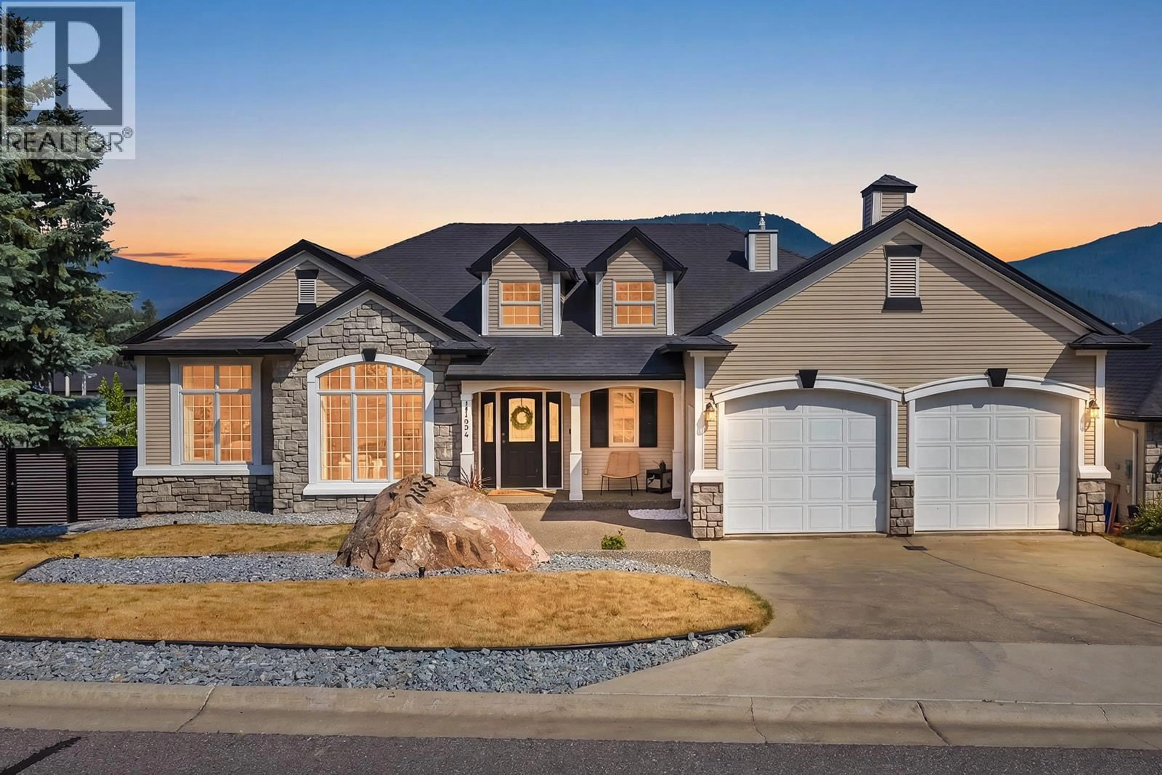 Home with brick exterior material, street for 7134 NAKISKA DRIVE, Vernon British Columbia V1B3M5