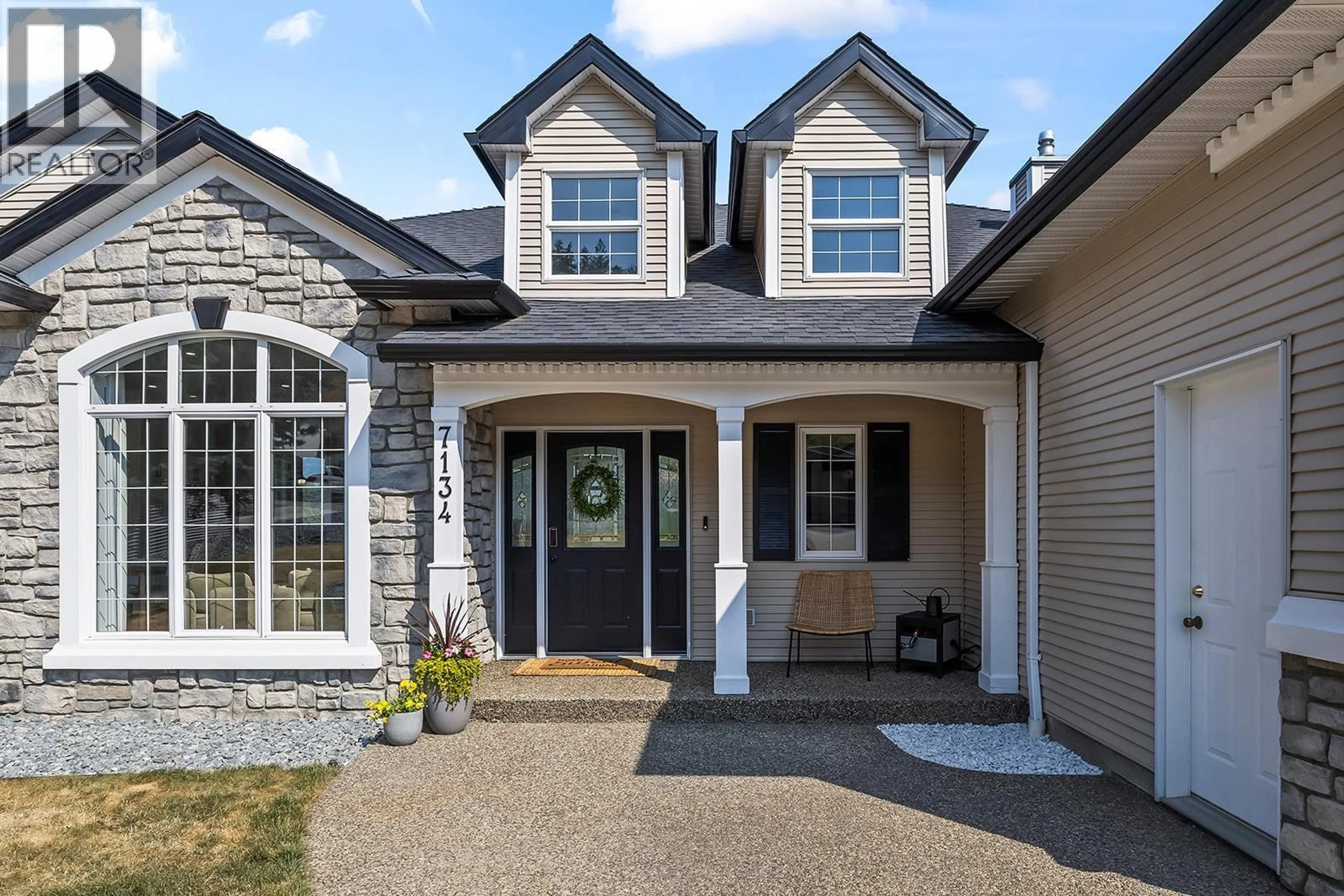 Home with brick exterior material, street for 7134 NAKISKA DRIVE, Vernon British Columbia V1B3M5