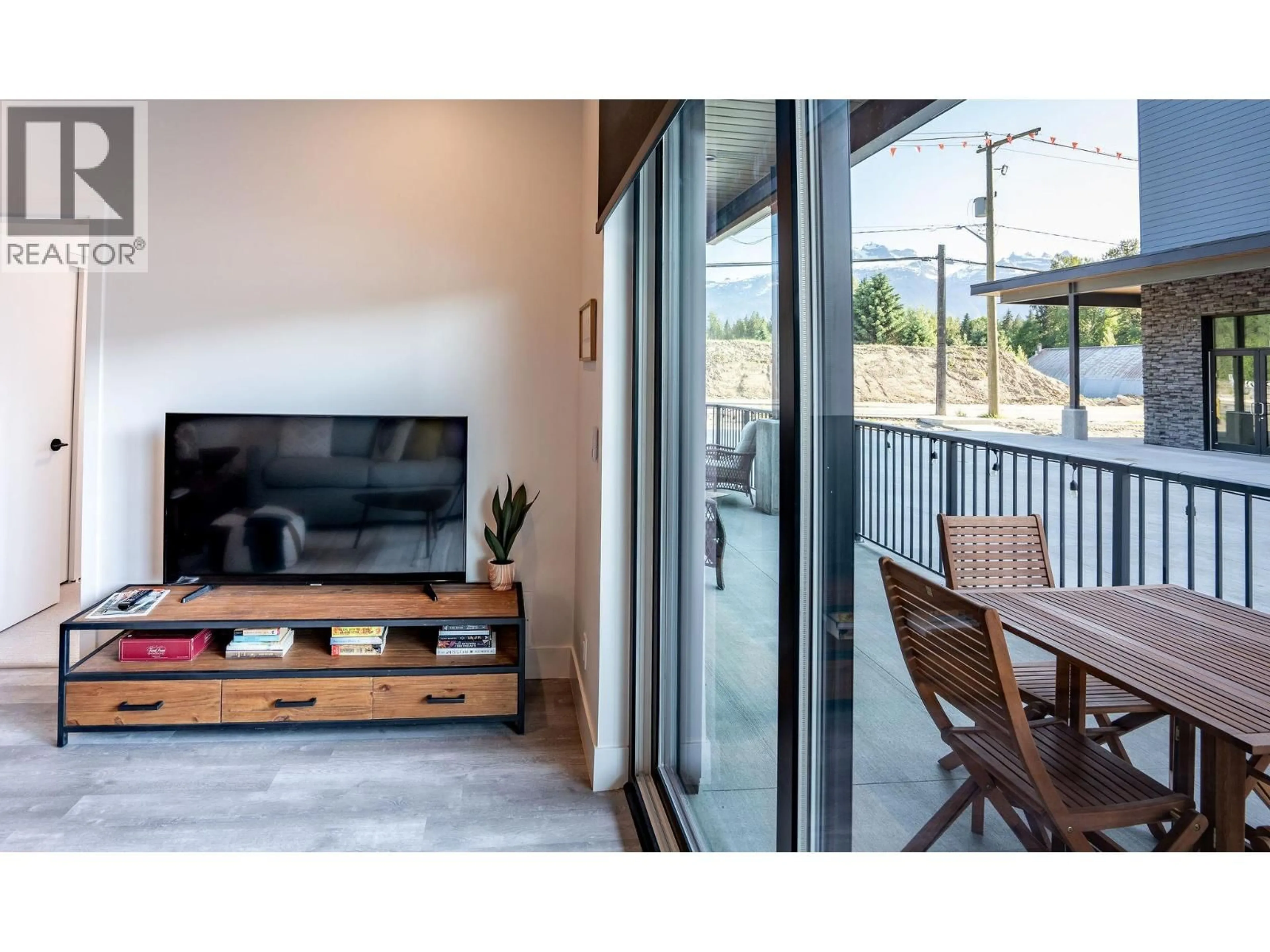 Living room with furniture, unknown for 1107 - 1701 COURSIER AVENUE, Revelstoke British Columbia V0E2S3