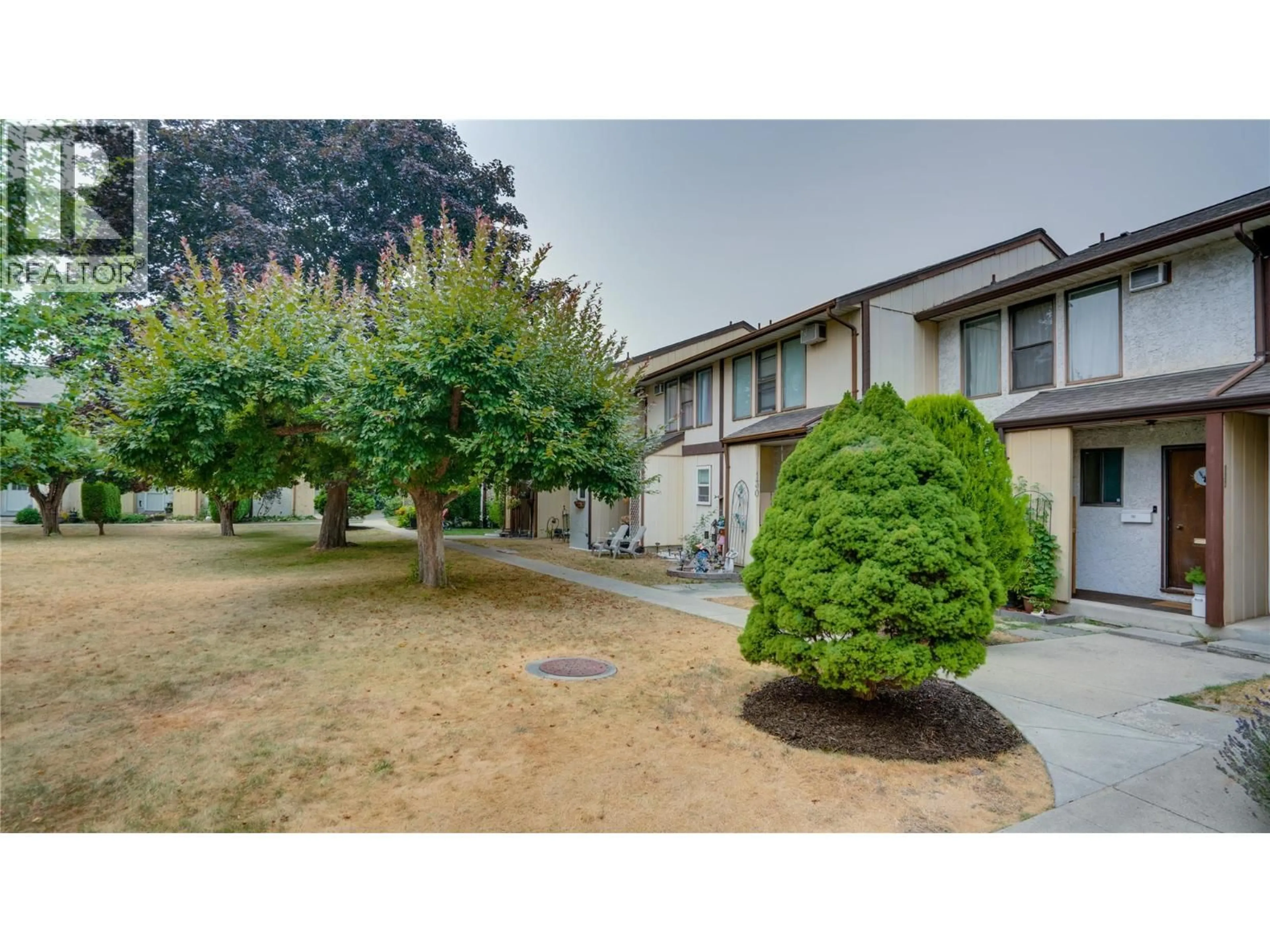 A pic from outside/outdoor area/front of a property/back of a property/a pic from drone, street for 131 - 4100 24 AVENUE, Vernon British Columbia V1T1M2