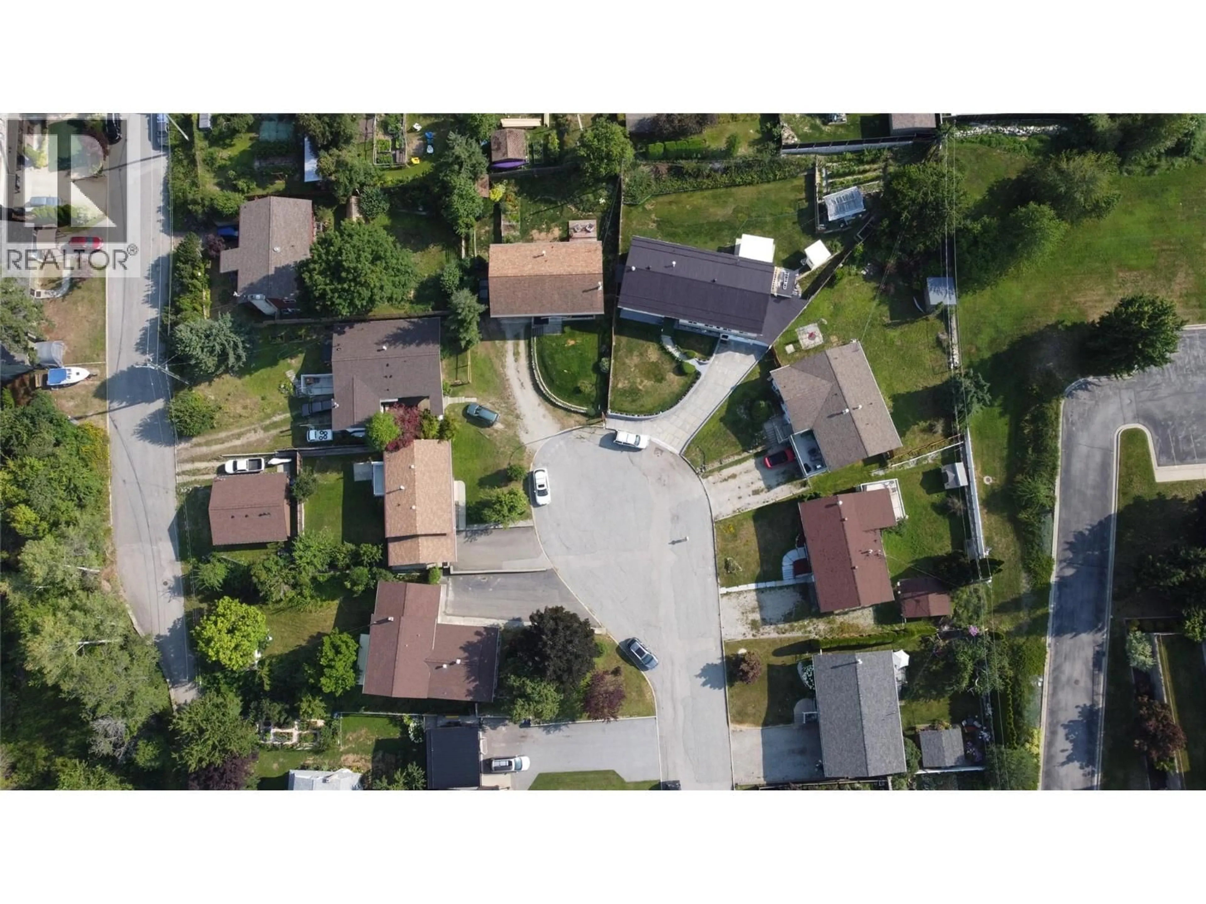 A pic from outside/outdoor area/front of a property/back of a property/a pic from drone, street for 1705 SLOCAN CRESCENT, Nelson British Columbia V1L5V6