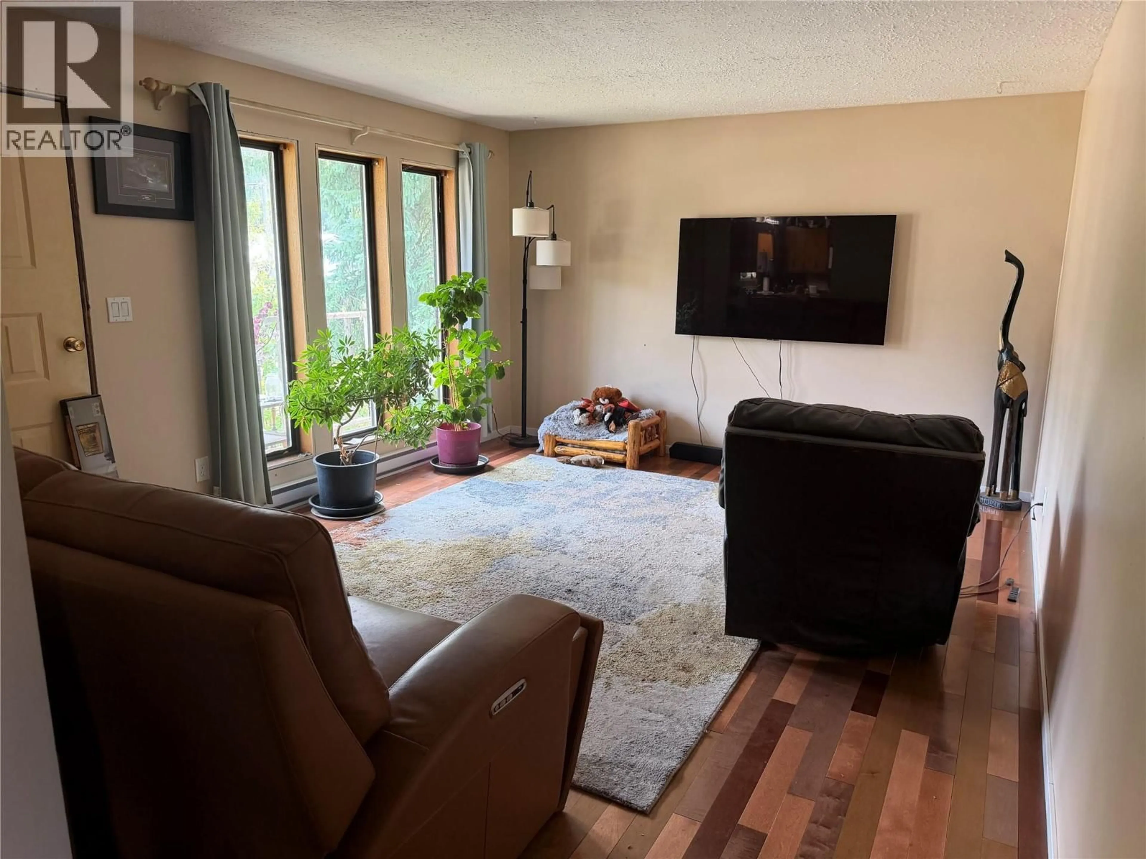 Living room with furniture, unknown for 4243 BLOOMQUIST ROAD, Malakwa British Columbia V0E2J0