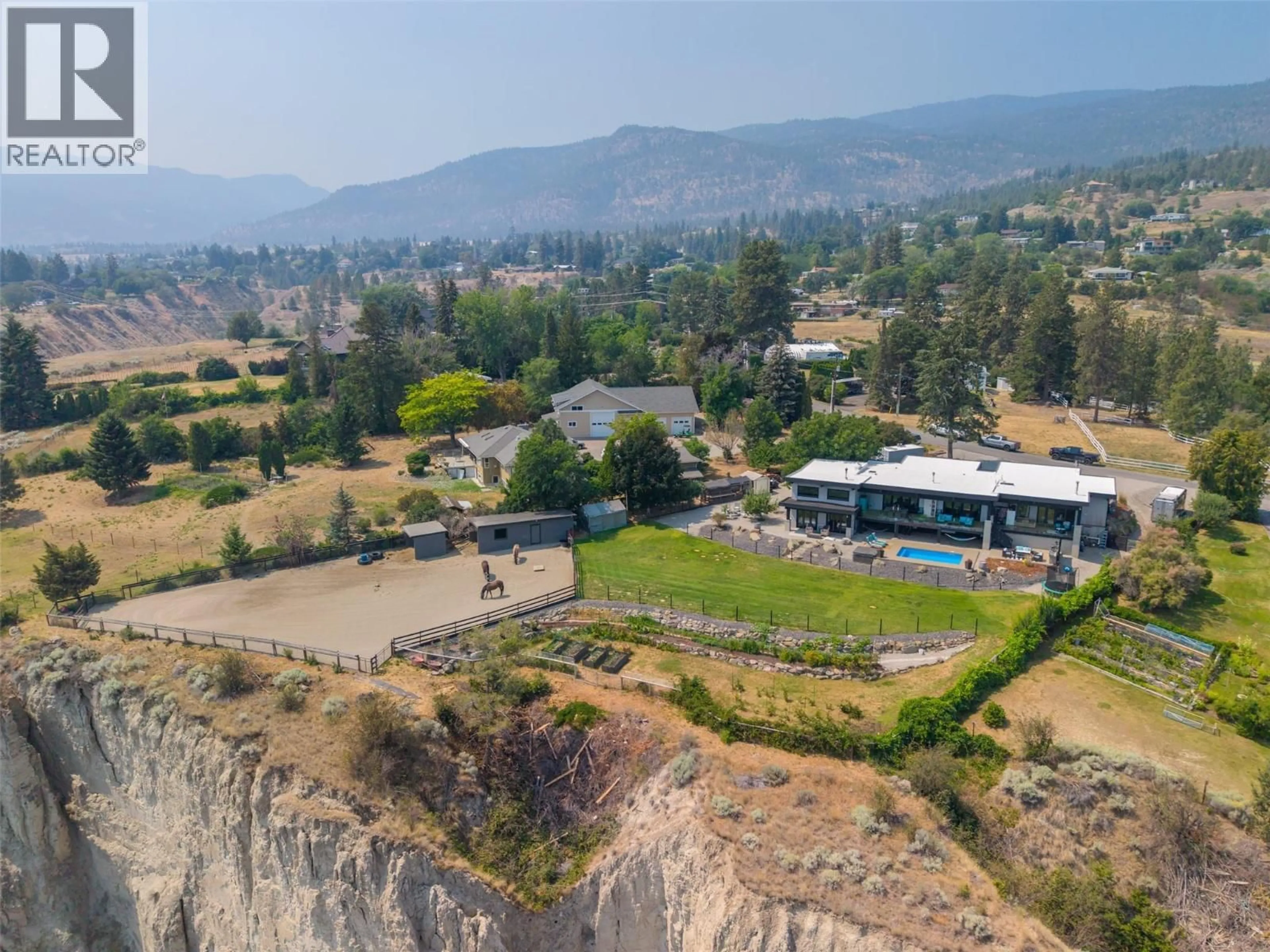 A pic from outside/outdoor area/front of a property/back of a property/a pic from drone, mountain view for 111 HYSLOP DRIVE, Penticton British Columbia V2A9A1