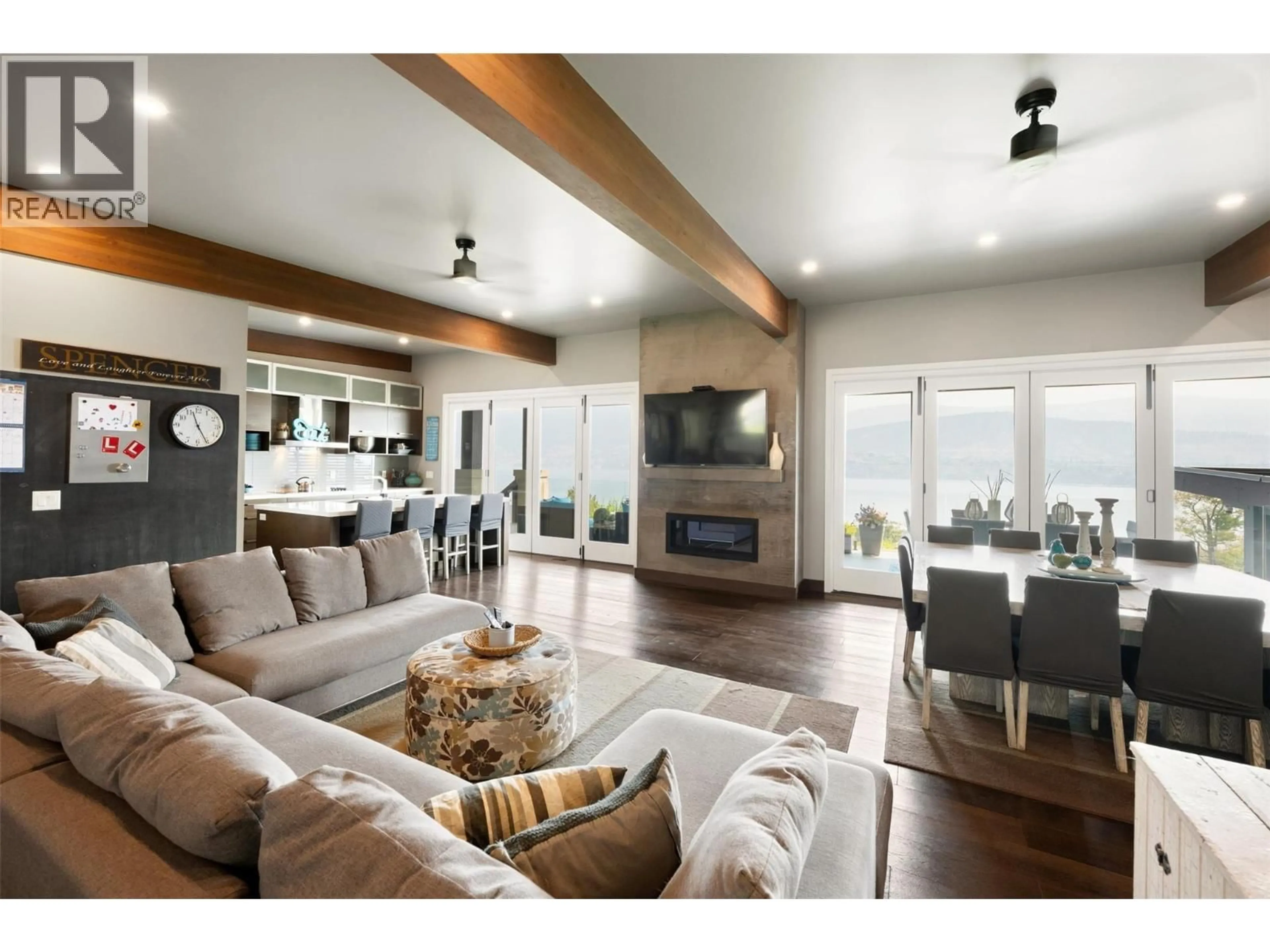 Living room with furniture, wood/laminate floor for 111 HYSLOP DRIVE, Penticton British Columbia V2A9A1