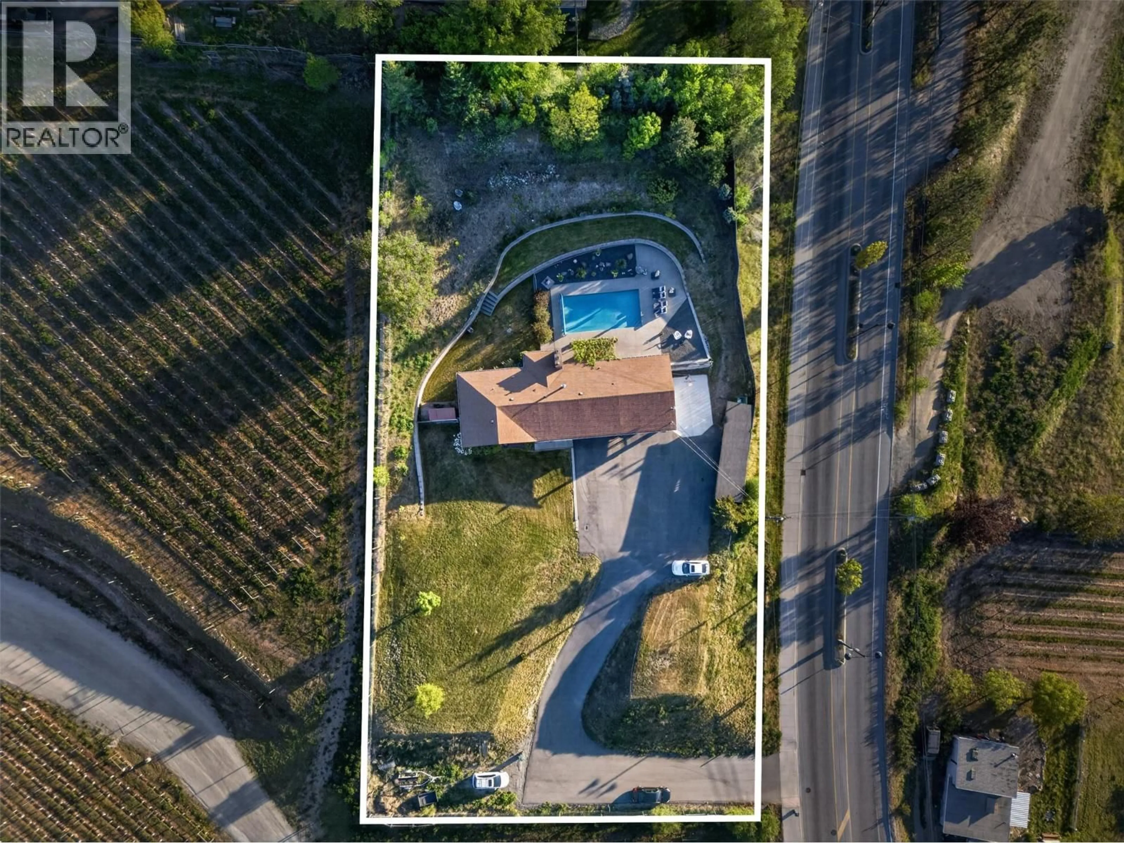 A pic from outside/outdoor area/front of a property/back of a property/a pic from drone, street for 2351 BOUCHERIE ROAD, West Kelowna British Columbia V1Z2E7