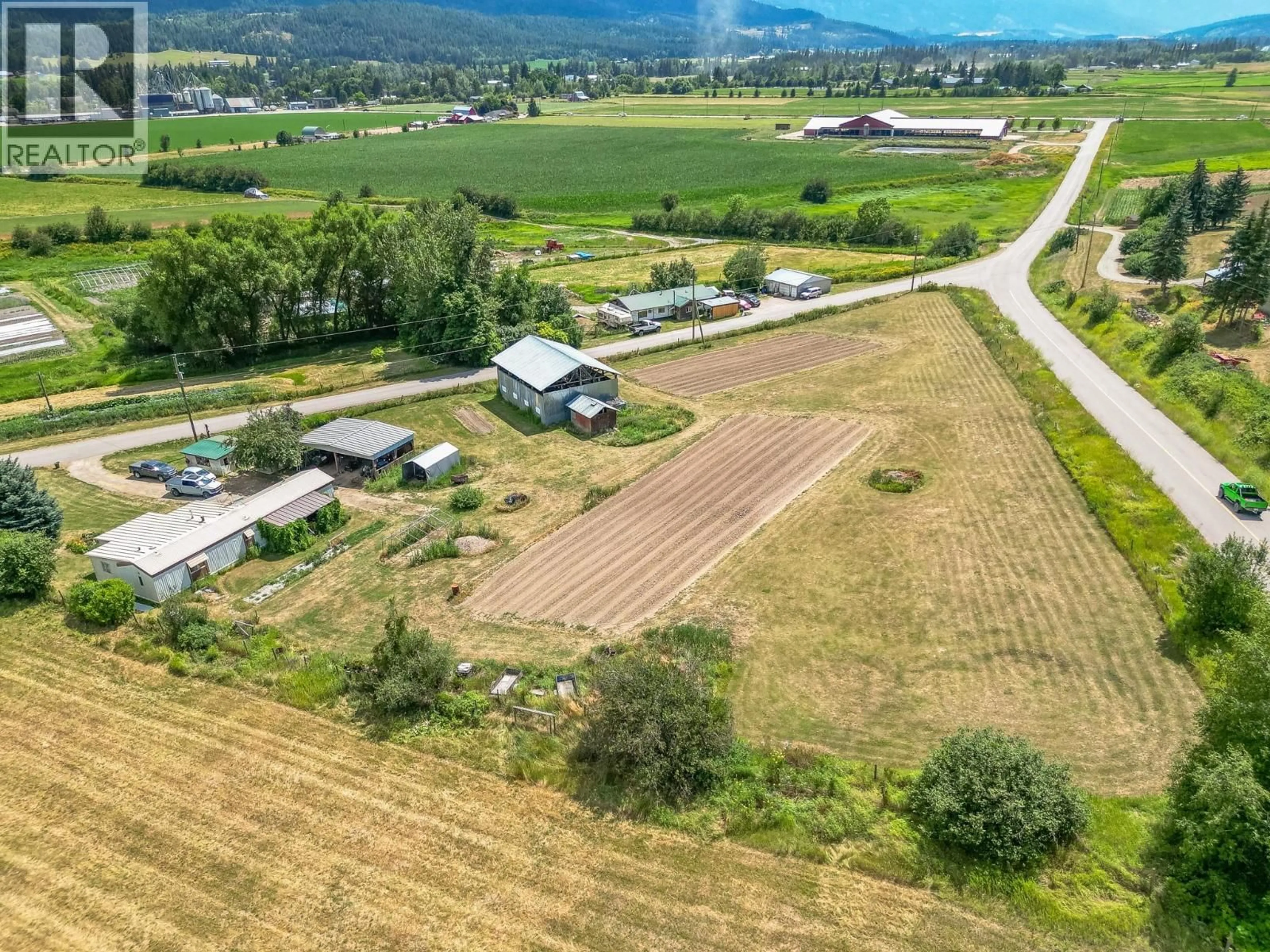 A pic from outside/outdoor area/front of a property/back of a property/a pic from drone, mountain view for 10 OLD SICAMOUS ROAD, Grindrod British Columbia V0E1Y0