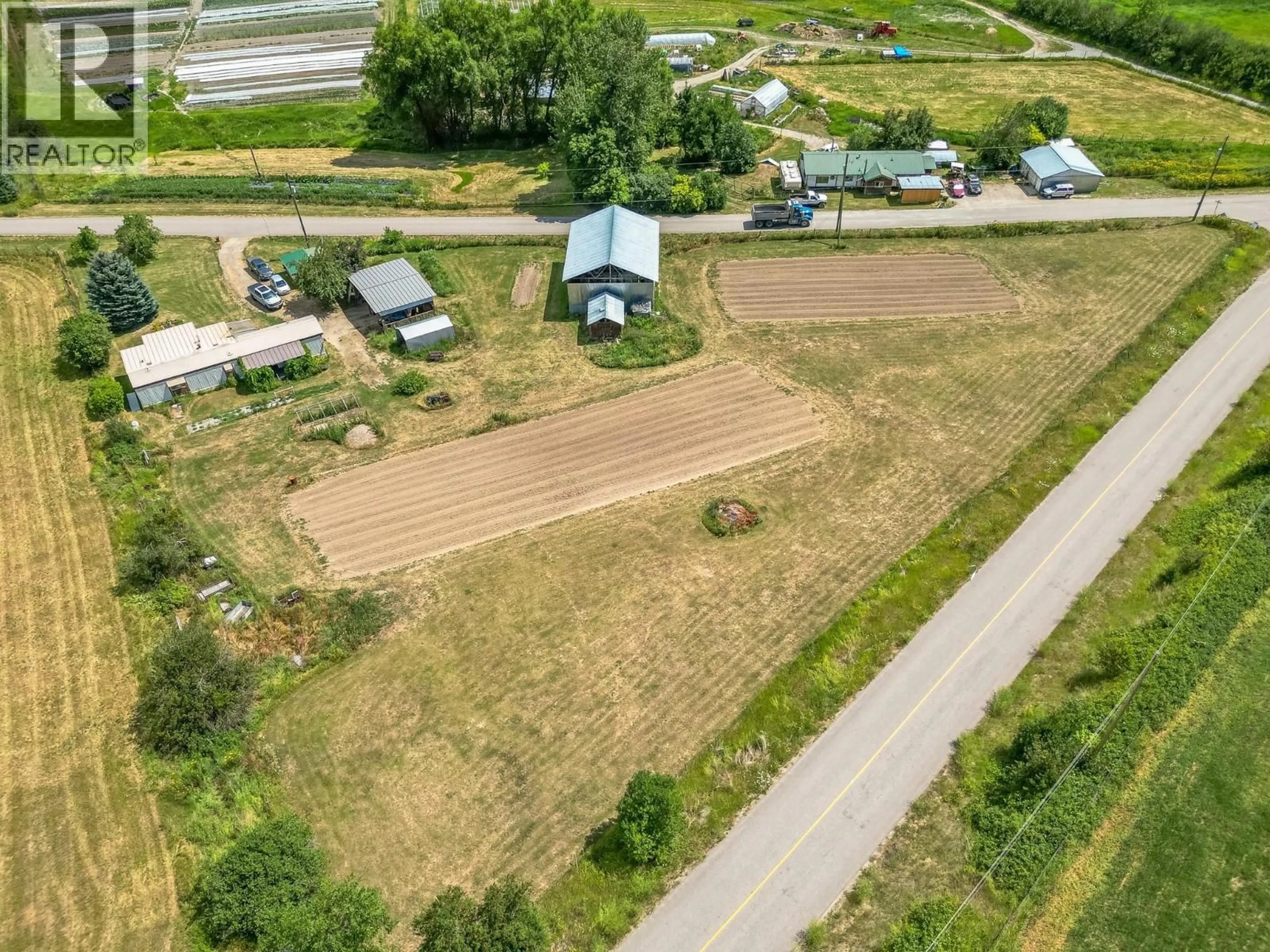 A pic from outside/outdoor area/front of a property/back of a property/a pic from drone, unknown for 10 OLD SICAMOUS ROAD, Grindrod British Columbia V0E1Y0