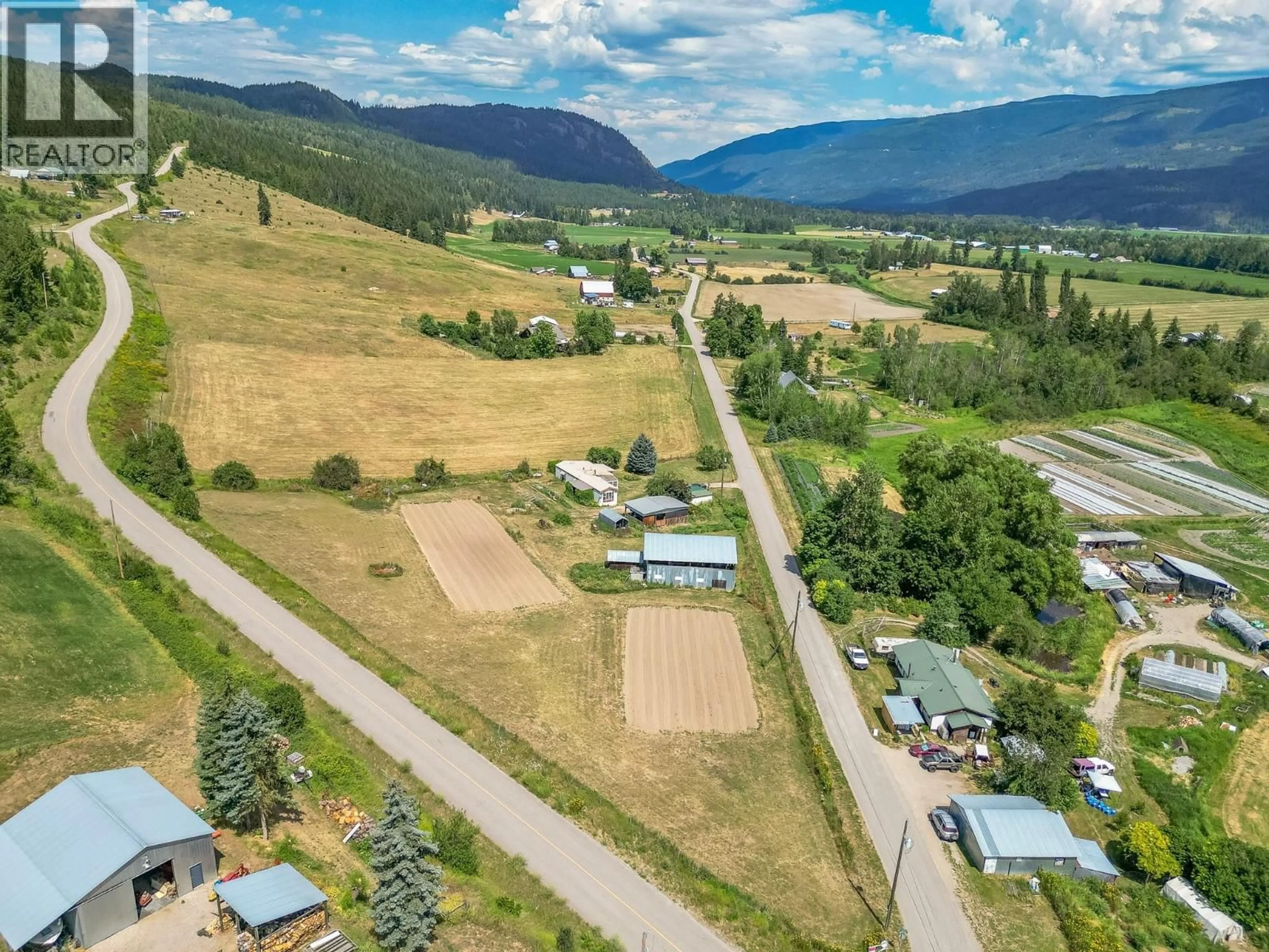A pic from outside/outdoor area/front of a property/back of a property/a pic from drone, mountain view for 10 OLD SICAMOUS ROAD, Grindrod British Columbia V0E1Y0