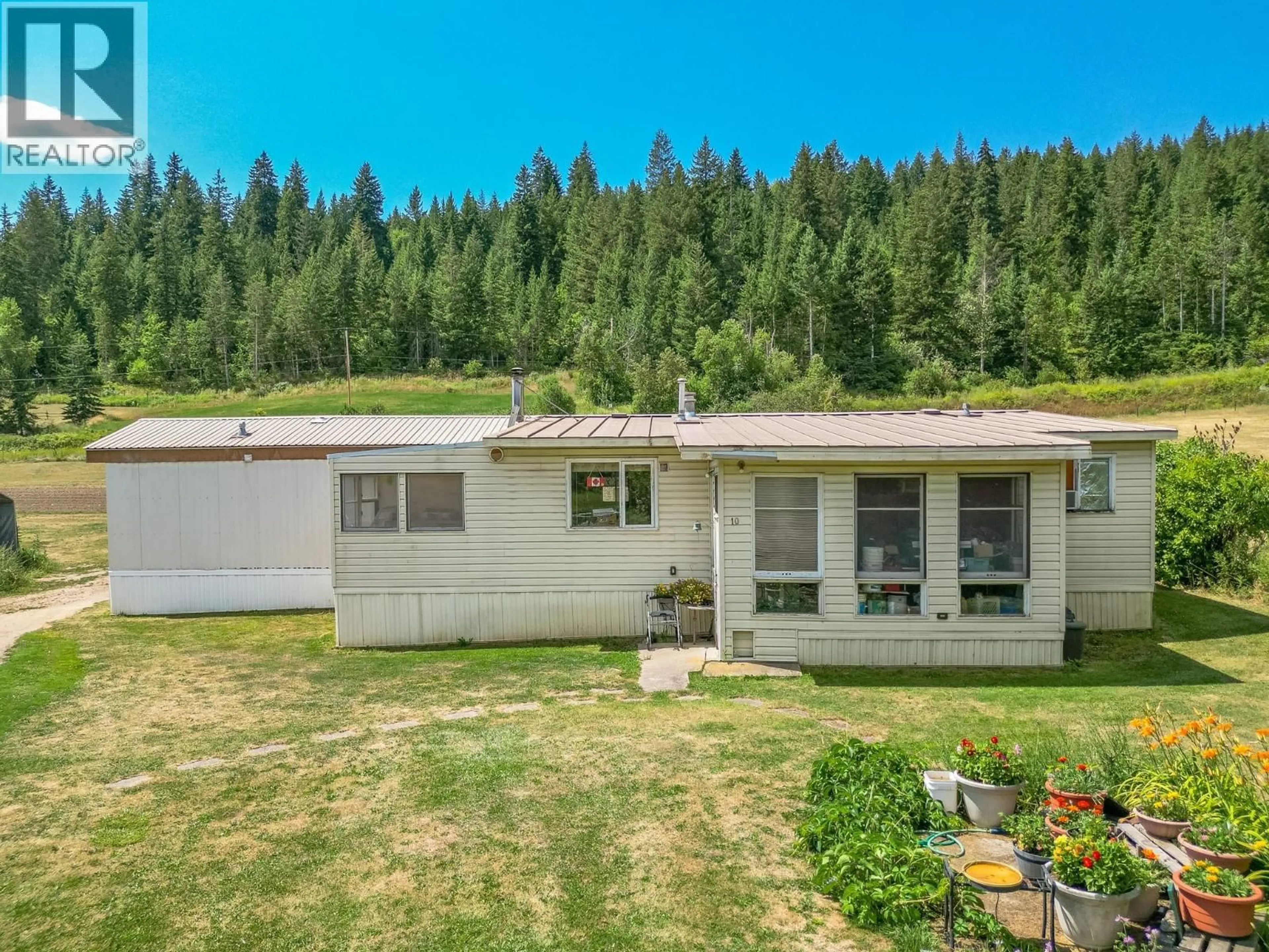 A pic from outside/outdoor area/front of a property/back of a property/a pic from drone, mountain view for 10 OLD SICAMOUS ROAD, Grindrod British Columbia V0E1Y0