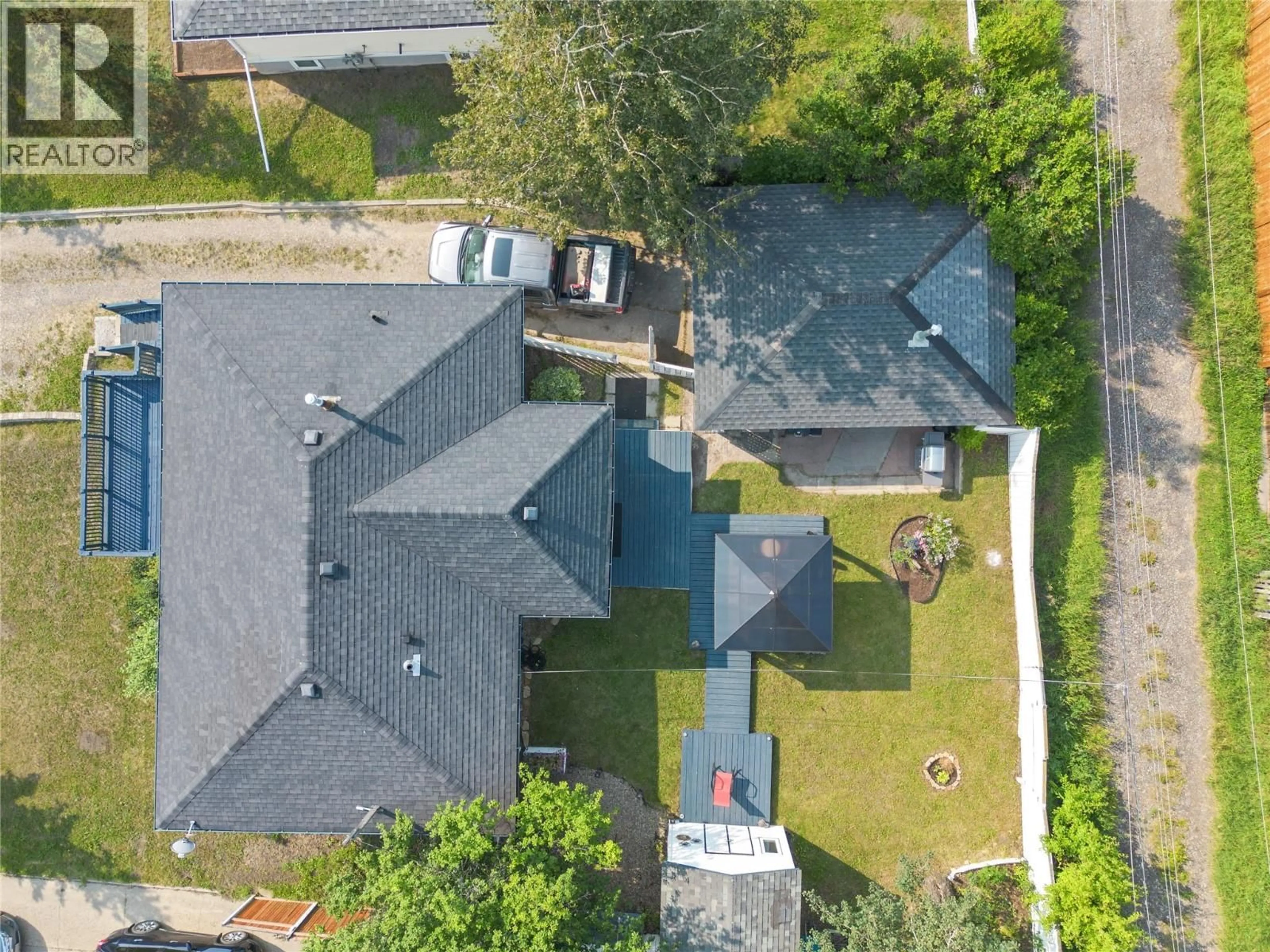 A pic from outside/outdoor area/front of a property/back of a property/a pic from drone, street for 1728 93 AVENUE, Dawson Creek British Columbia V1G1E6