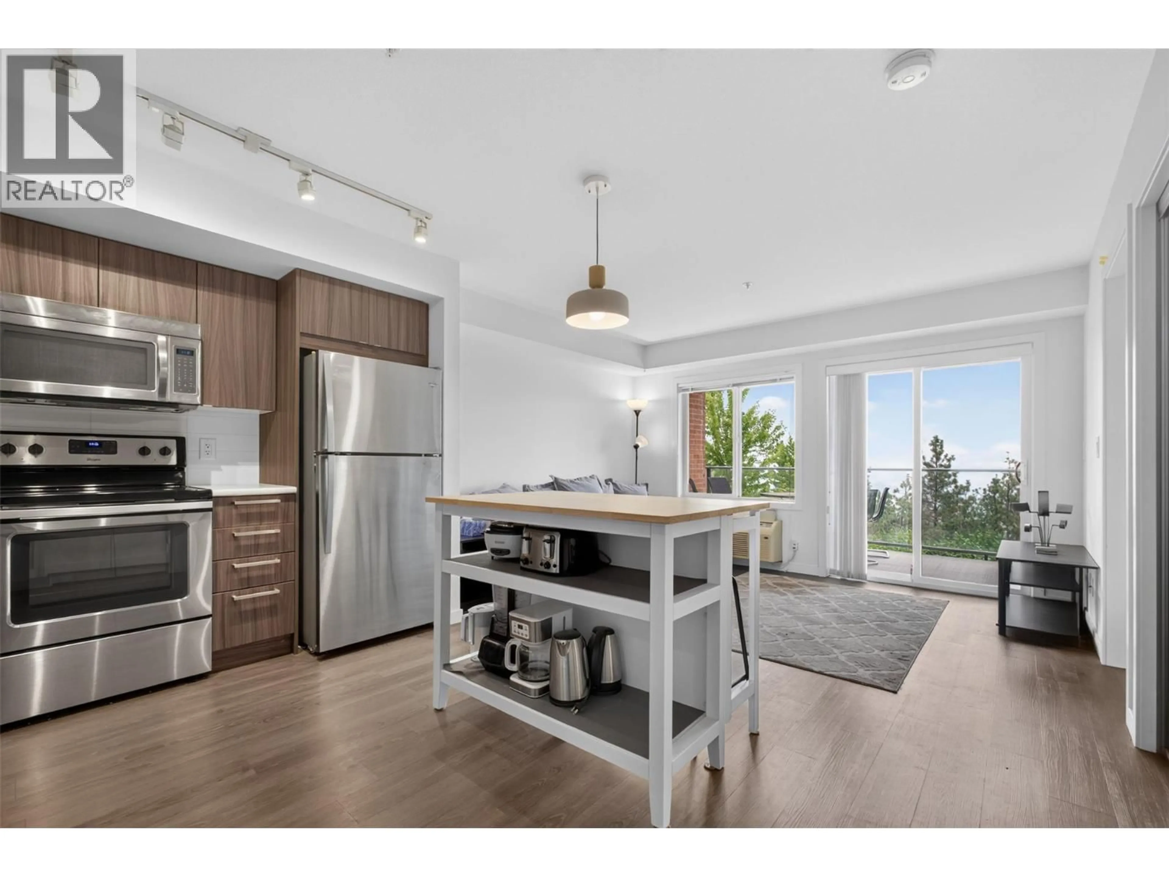 Open concept kitchen, unknown for 103 - 883 ACADEMY WAY, Kelowna British Columbia V1V0A3