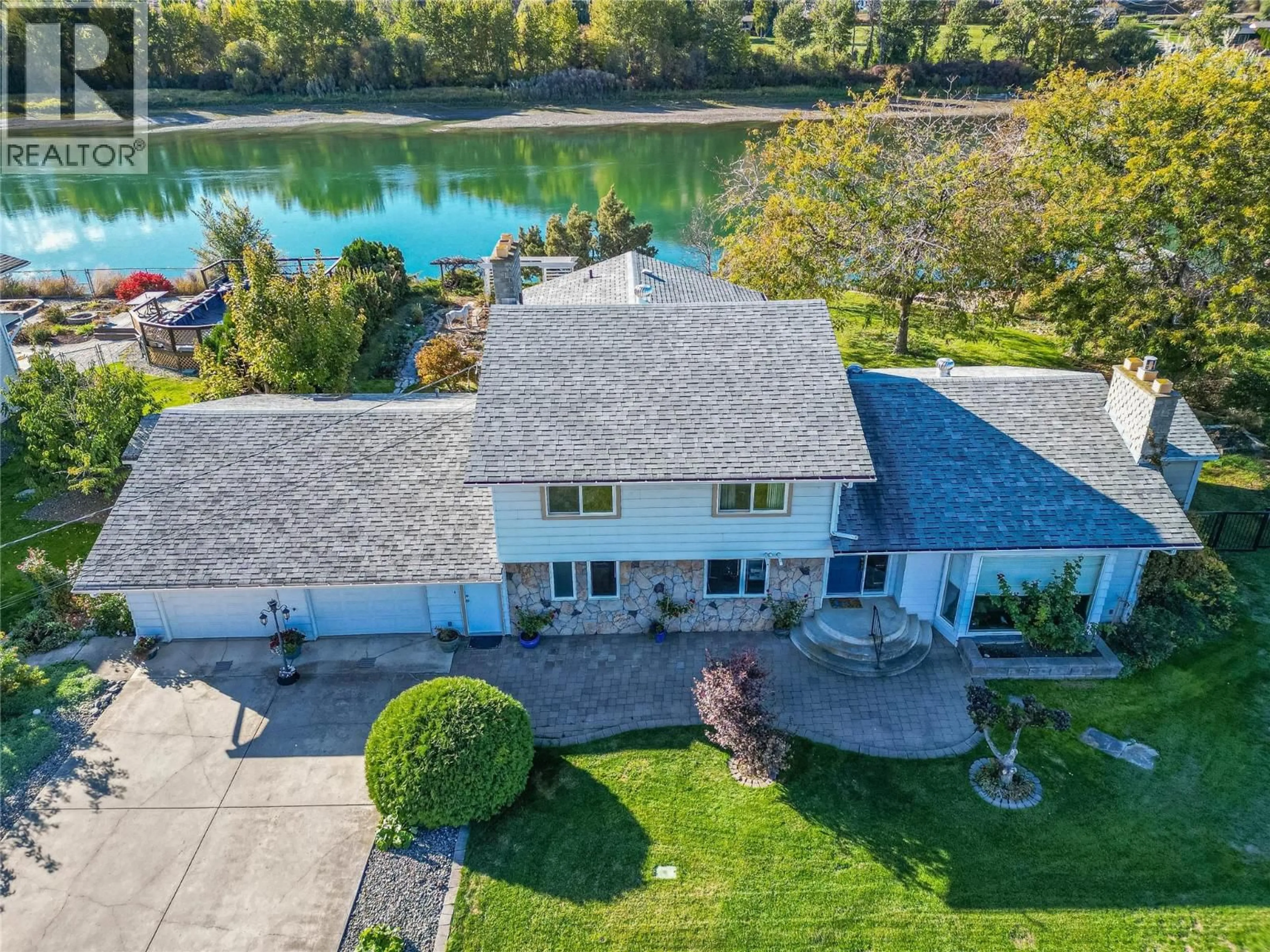 A pic from outside/outdoor area/front of a property/back of a property/a pic from drone, water/lake/river/ocean view for 4247 FURIAK ROAD, Kamloops British Columbia V2H1L3