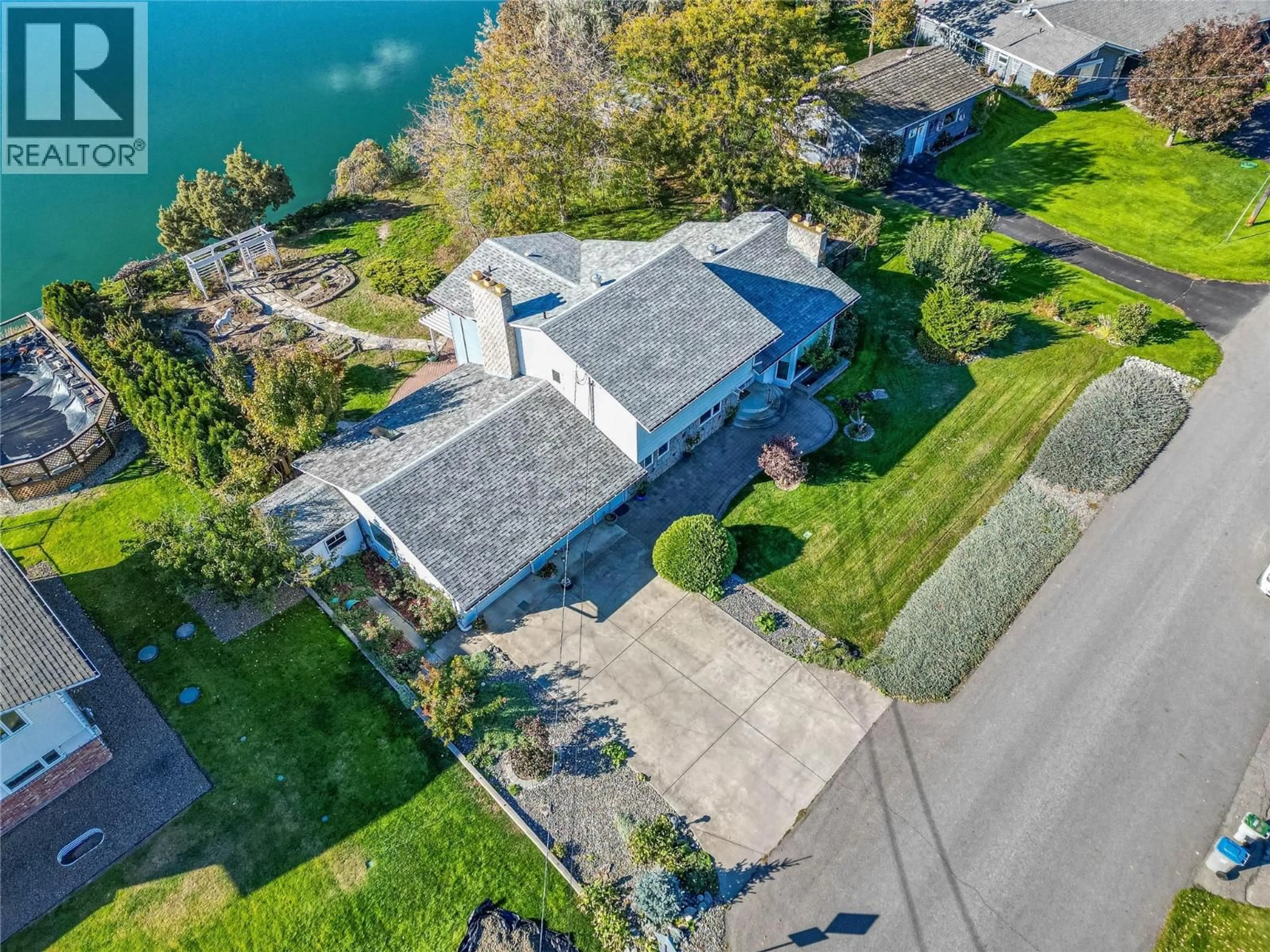 A pic from outside/outdoor area/front of a property/back of a property/a pic from drone, water/lake/river/ocean view for 4247 FURIAK ROAD, Kamloops British Columbia V2H1L3