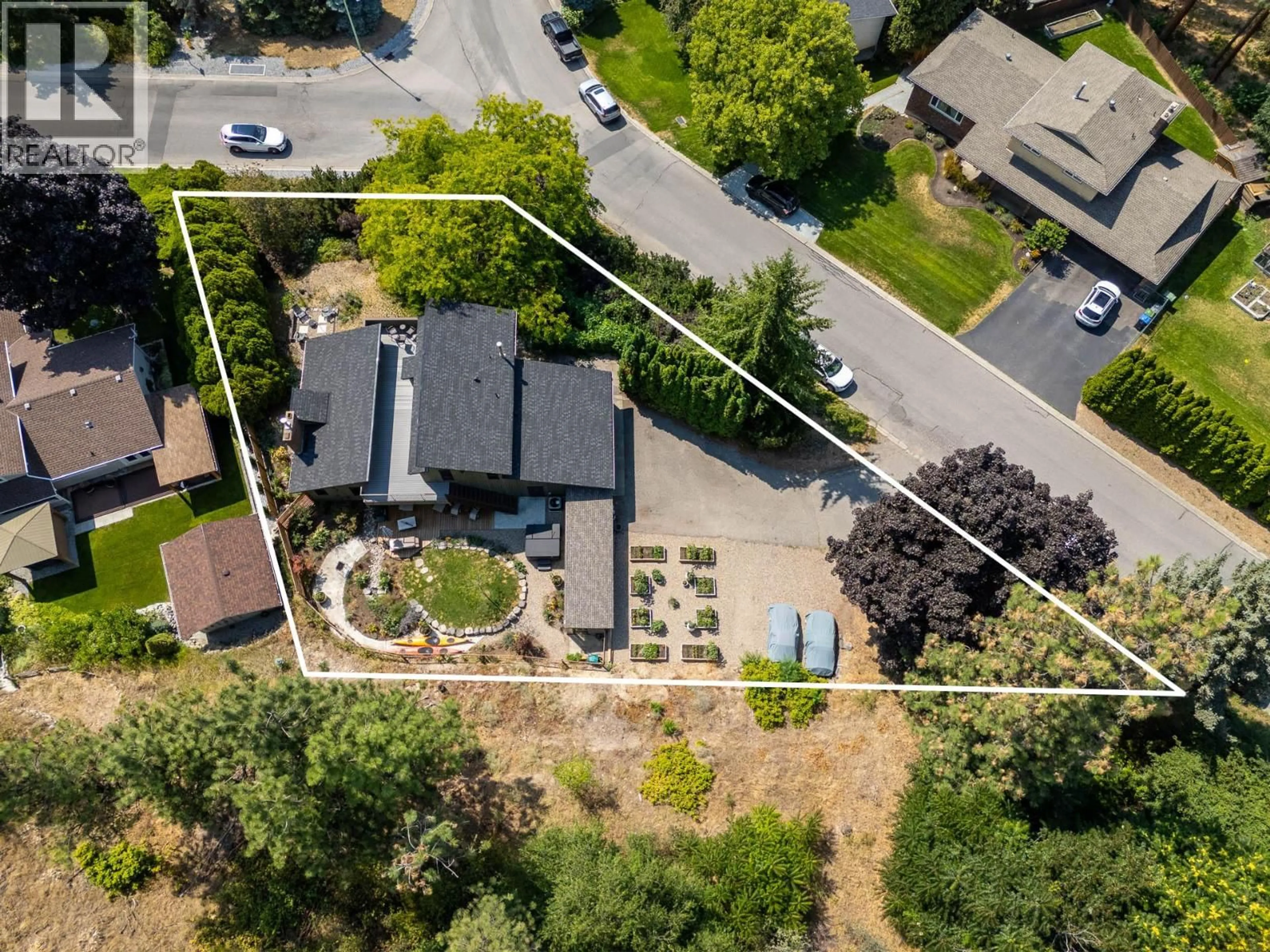 A pic from outside/outdoor area/front of a property/back of a property/a pic from drone, street for 2635 PACKERS ROAD, Kelowna British Columbia V1W2W8