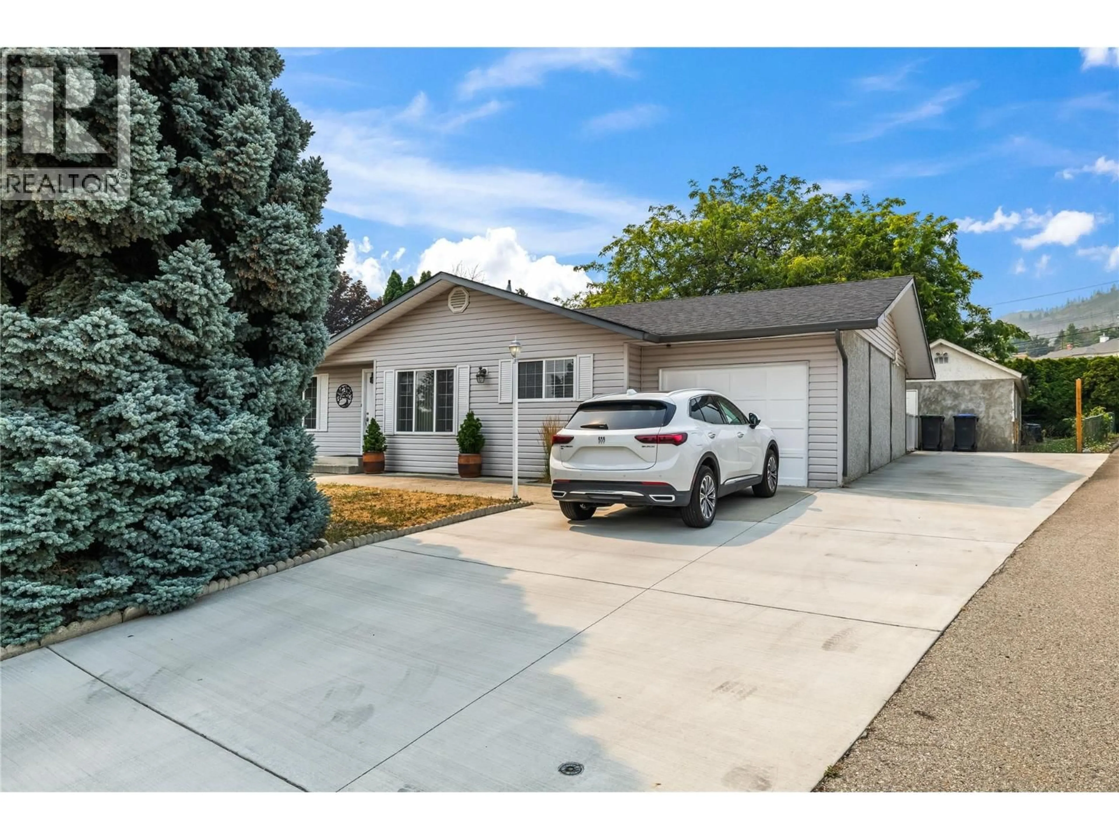 Home with vinyl exterior material, street for 3792 SALLOUM ROAD, West Kelowna British Columbia V4T1E3