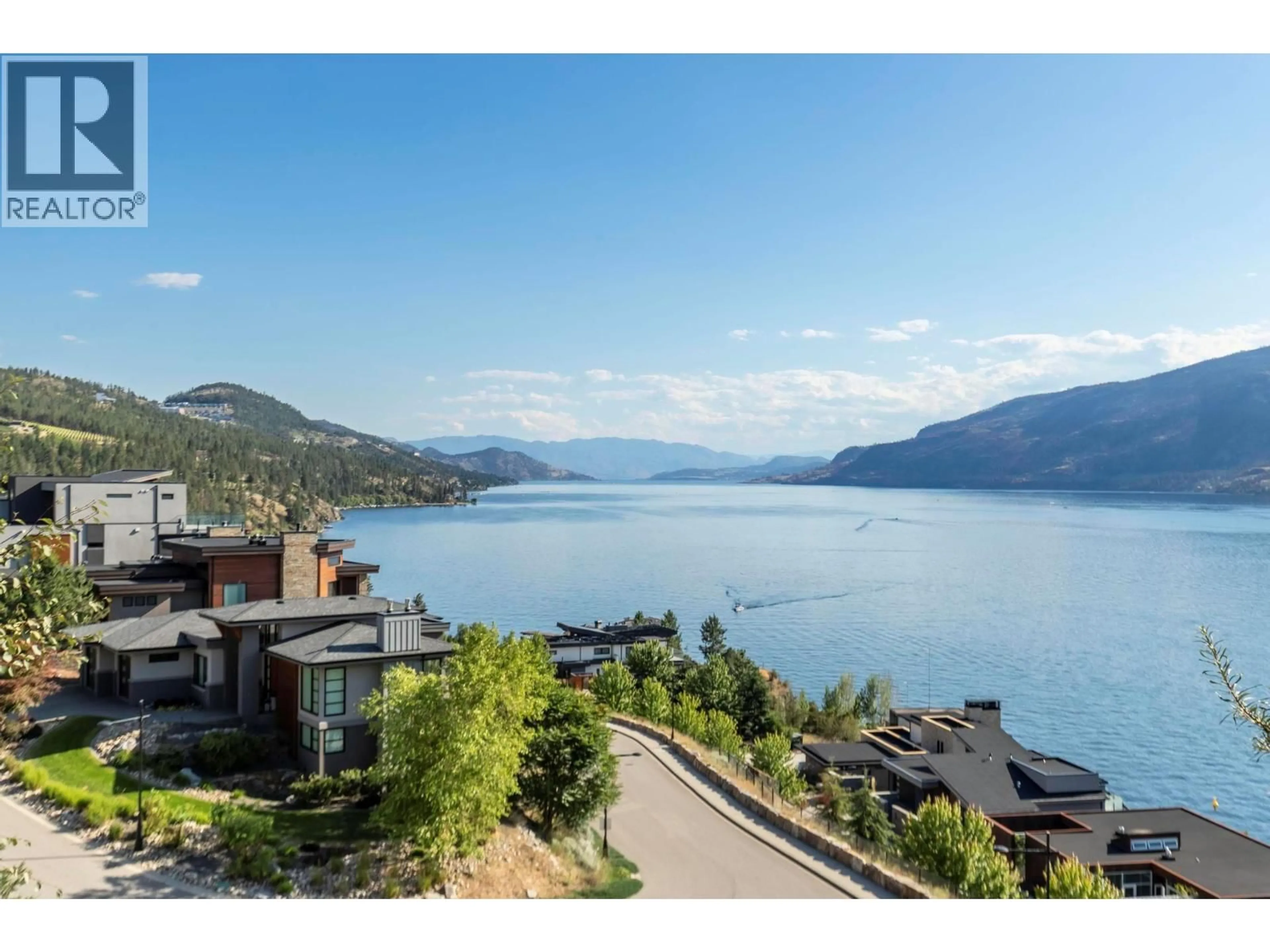 A pic from outside/outdoor area/front of a property/back of a property/a pic from drone, water/lake/river/ocean view for 1502 MARBLE LEDGE DRIVE, Lake Country British Columbia V4V2T4