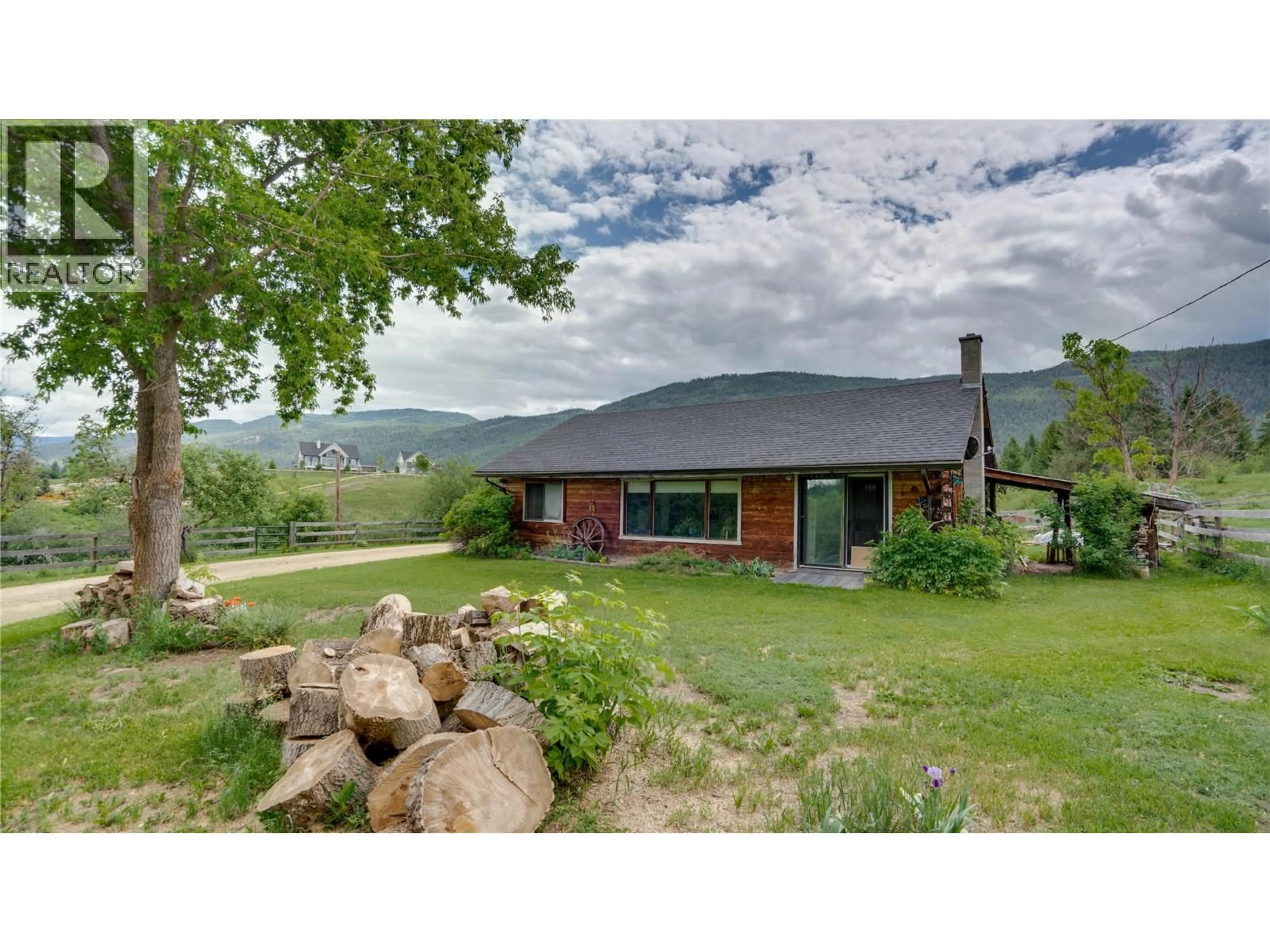 A pic from outside/outdoor area/front of a property/back of a property/a pic from drone, mountain view for 4878 STEPNEY ROAD, Spallumcheen British Columbia V4Y0R7