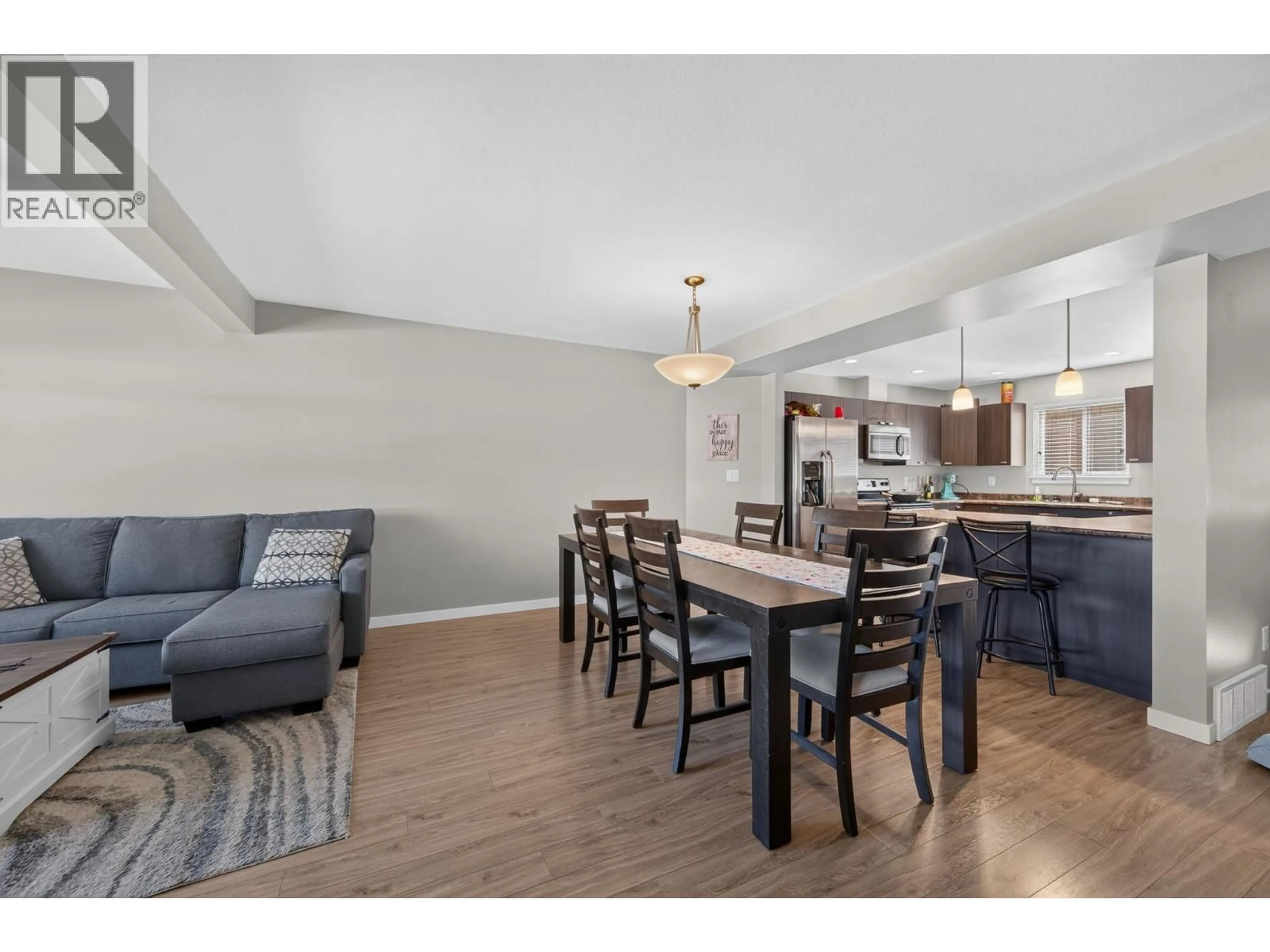 Open concept kitchen, wood/laminate floor for 6 - 1711 COPPERHEAD DRIVE, Kamloops British Columbia V1S0C2