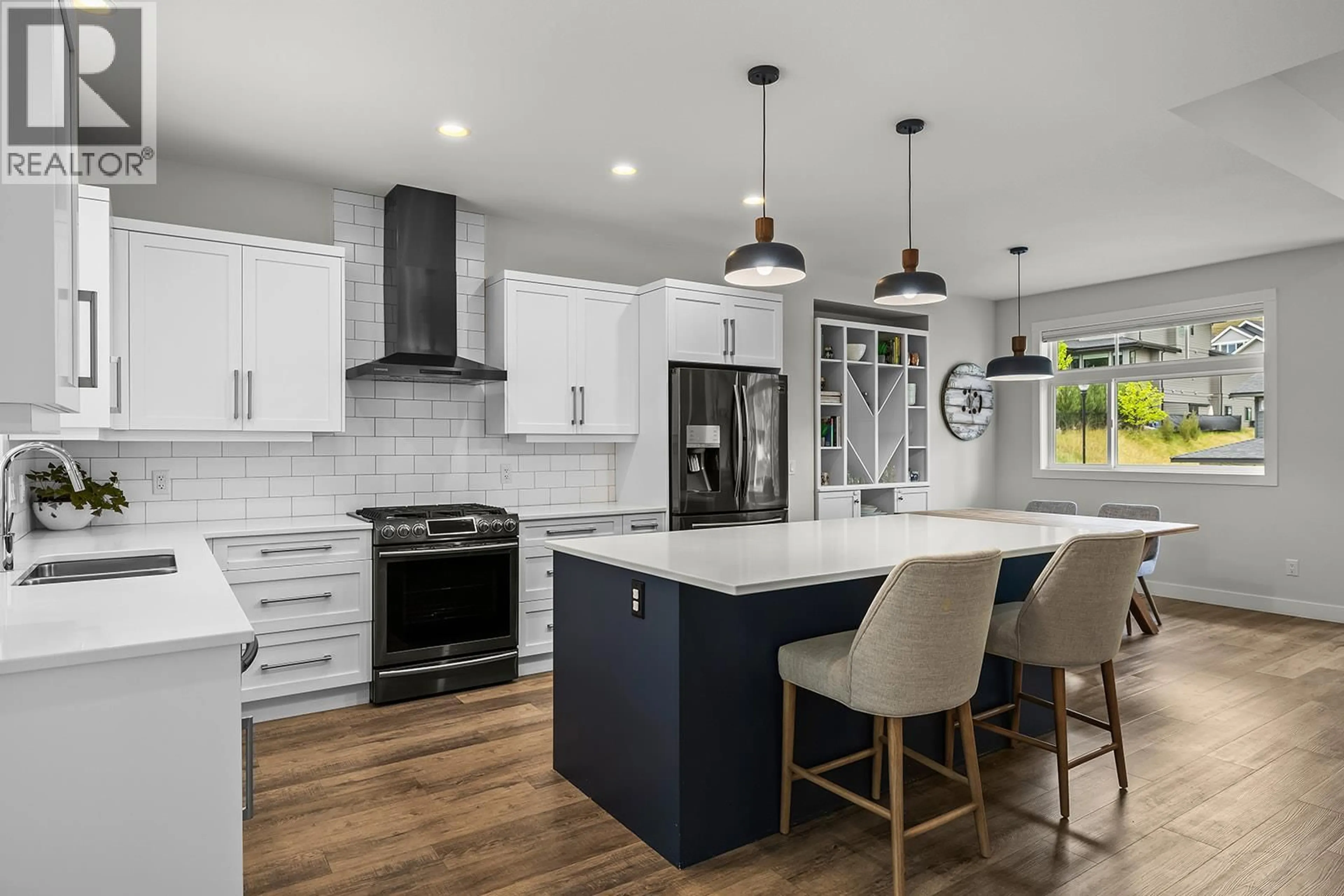 Open concept kitchen, ceramic/tile floor for 21 FOREST EDGE DRIVE, Kelowna British Columbia V1V3G3