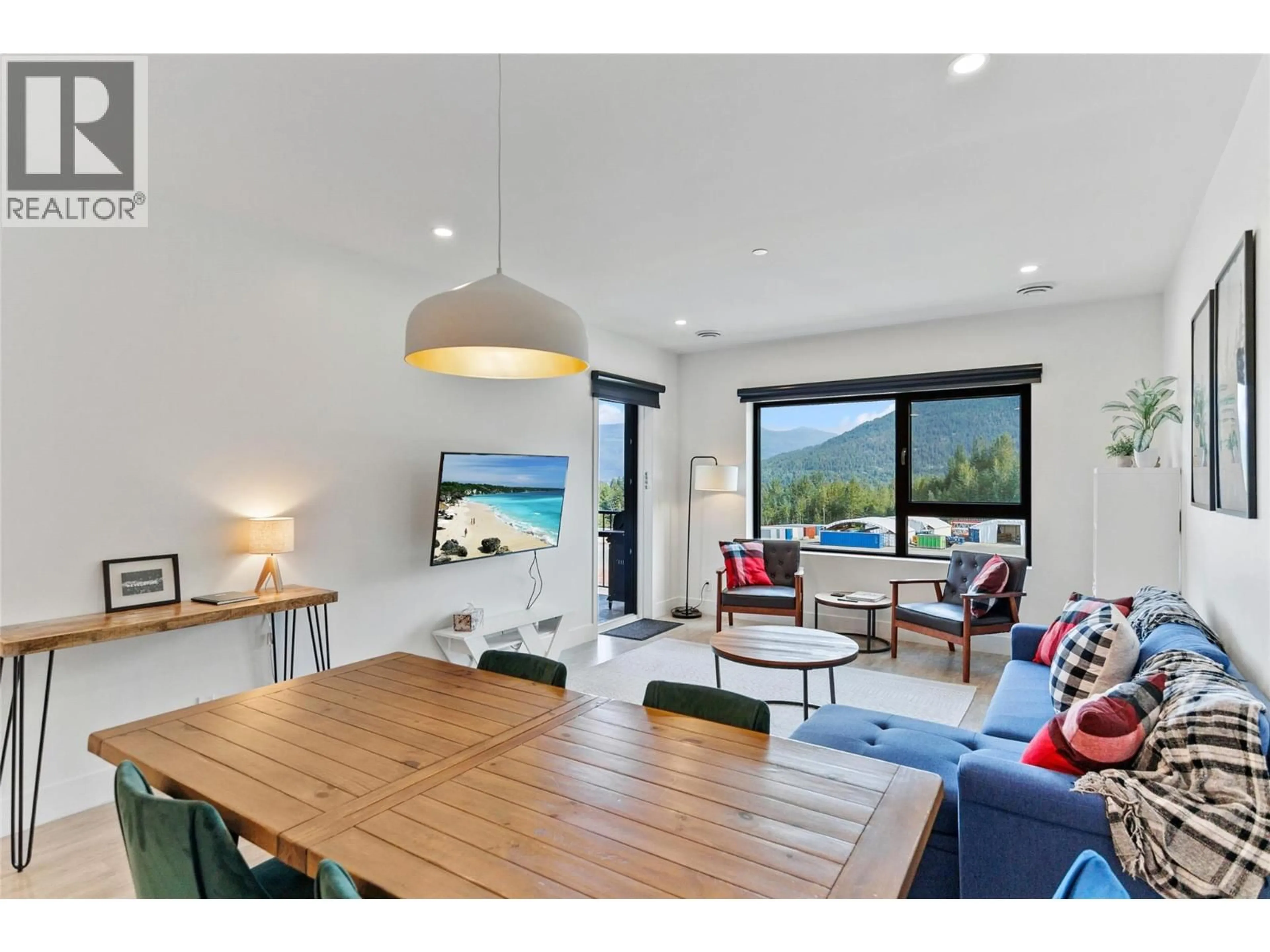 Living room with furniture, wood/laminate floor for 3406 - 1701 COURSIER AVENUE, Revelstoke British Columbia V0E2S3