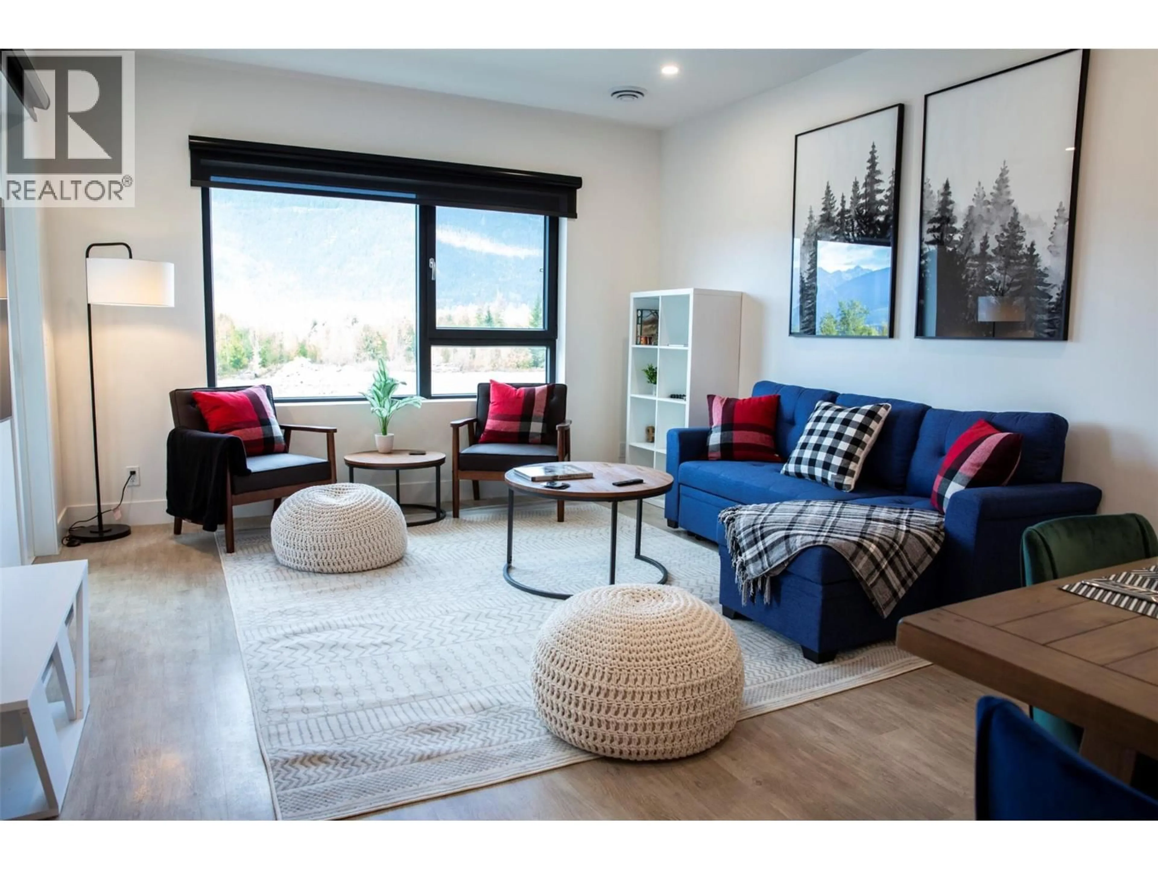 Living room with furniture, wood/laminate floor for 3406 - 1701 COURSIER AVENUE, Revelstoke British Columbia V0E2S3