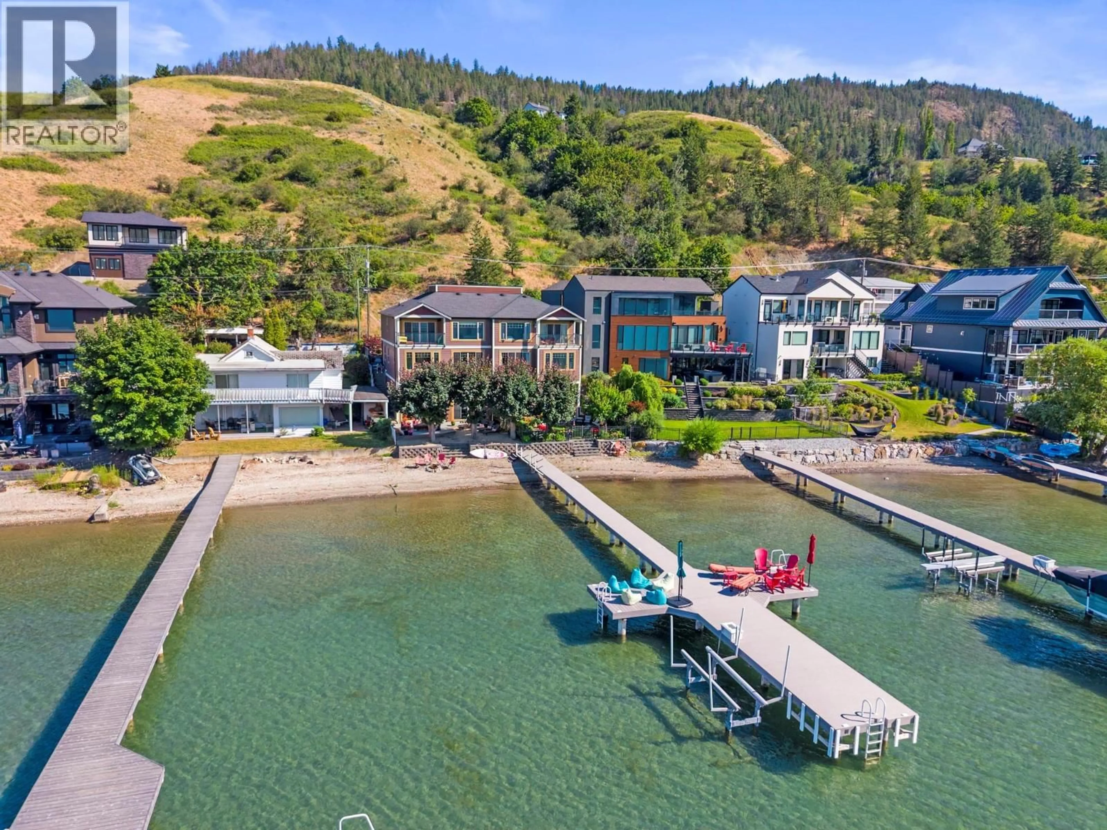 A pic from outside/outdoor area/front of a property/back of a property/a pic from drone, water/lake/river/ocean view for 8049 OKANAGAN LANDING ROAD, Vernon British Columbia V1H1J4