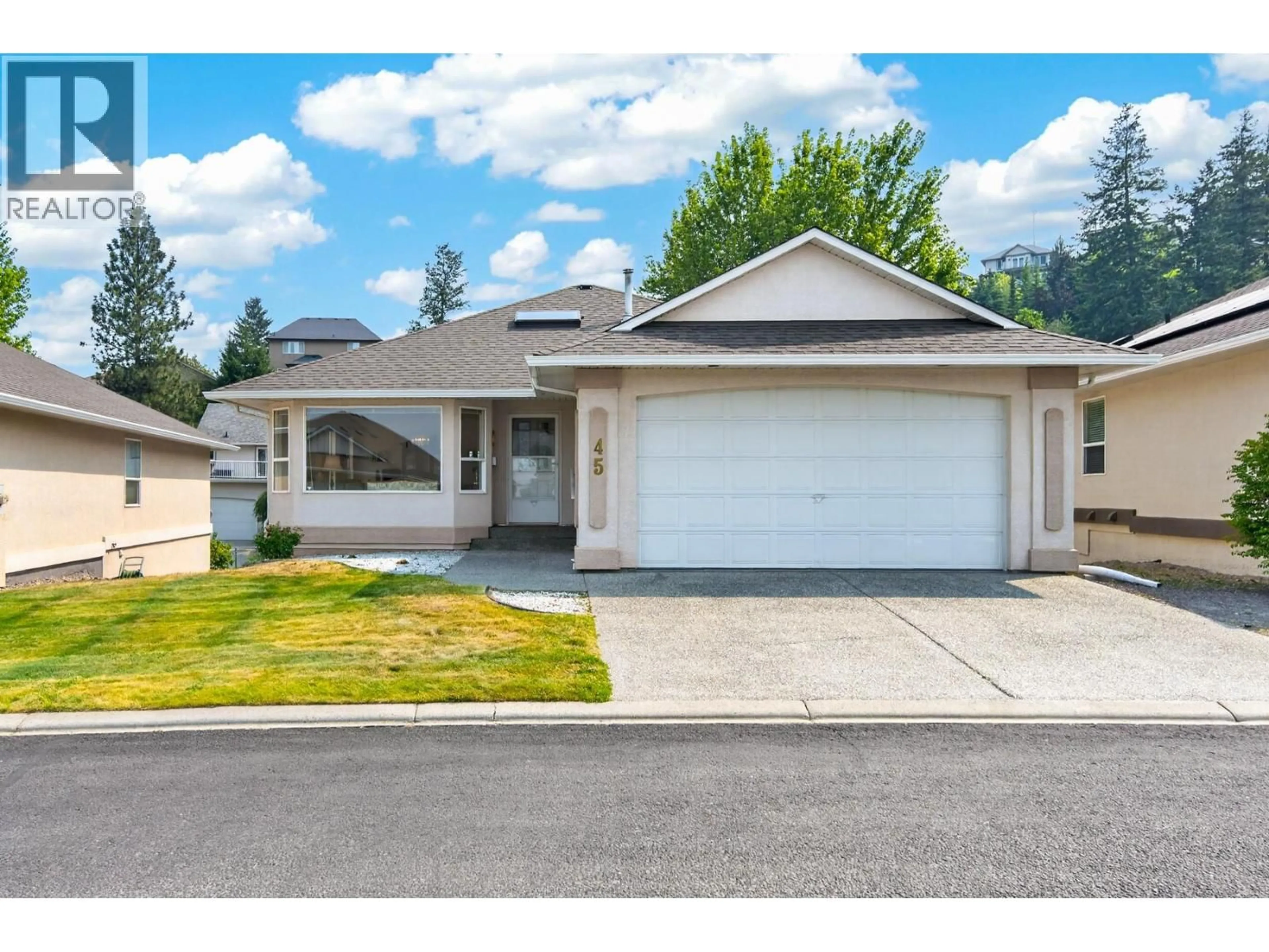 Home with vinyl exterior material, street for 45 - 1575 SPRINGHILL DRIVE, Kamloops British Columbia V2E2N9