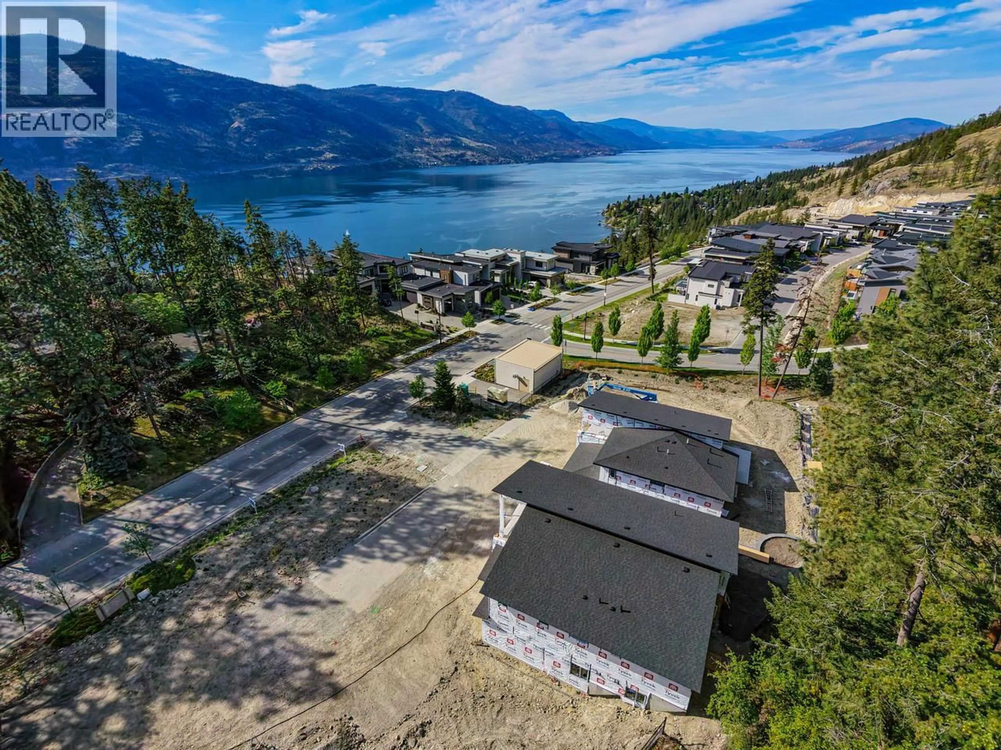 A pic from outside/outdoor area/front of a property/back of a property/a pic from drone, water/lake/river/ocean view for 491 CLIFTON ROAD NORTH, Kelowna British Columbia V1V1H1